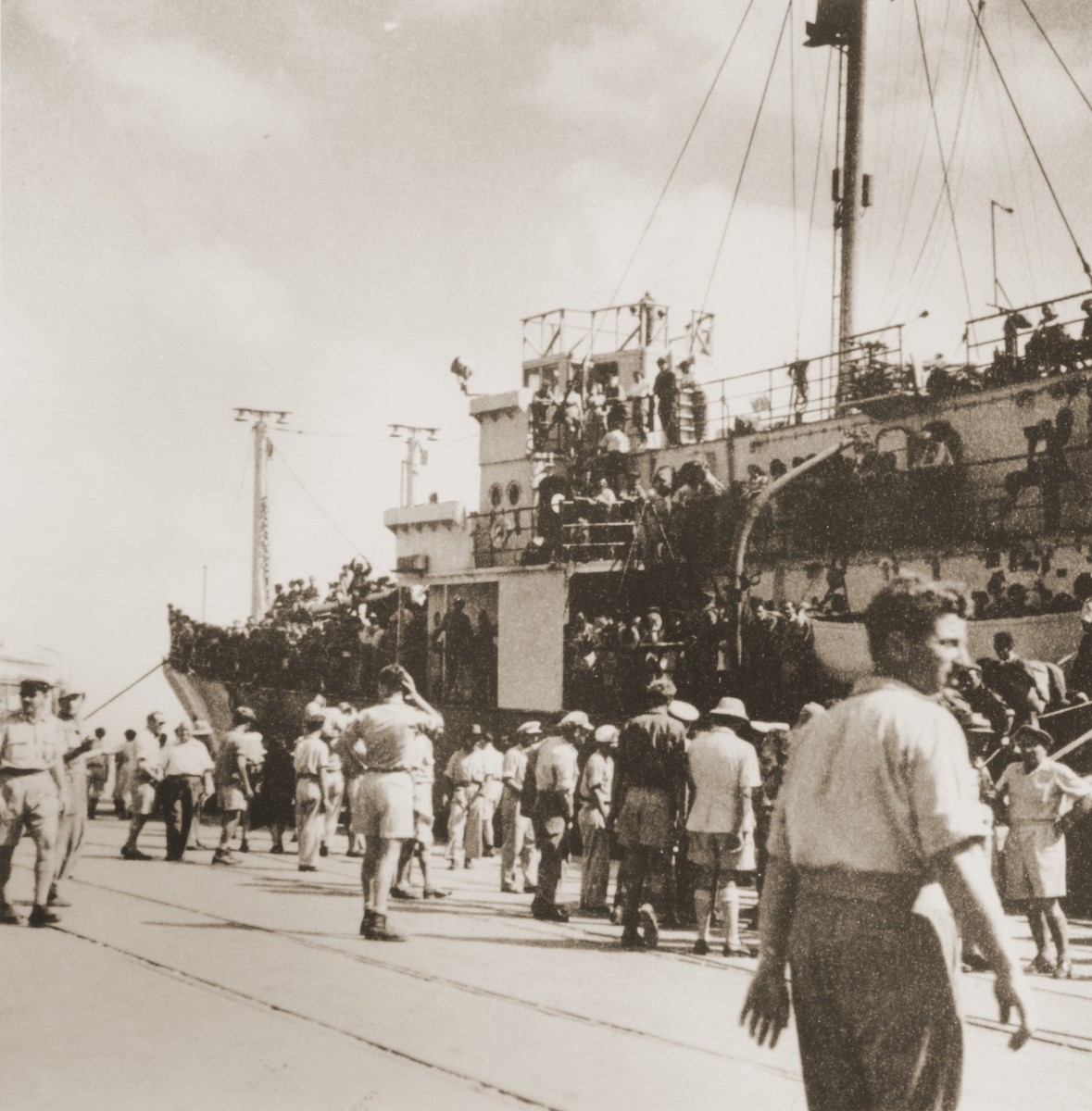 Passengers disembark from the Mala immigrant ship in the port of Haifa.