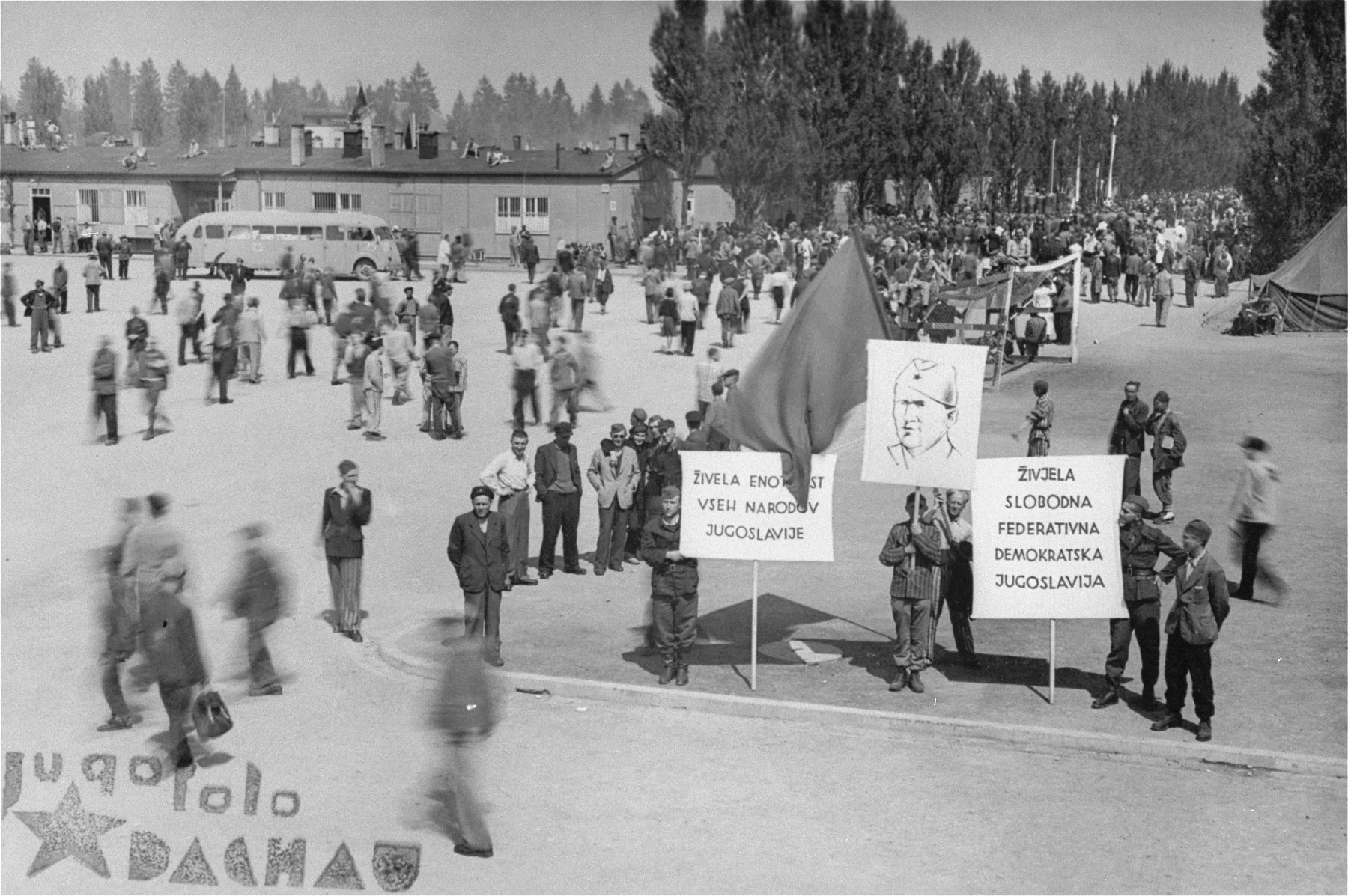 Yugoslavian survivors honoring Tito and the Yugoslav resistance during a gathering to salute the Allies and remember comrades who perished in Dachau.