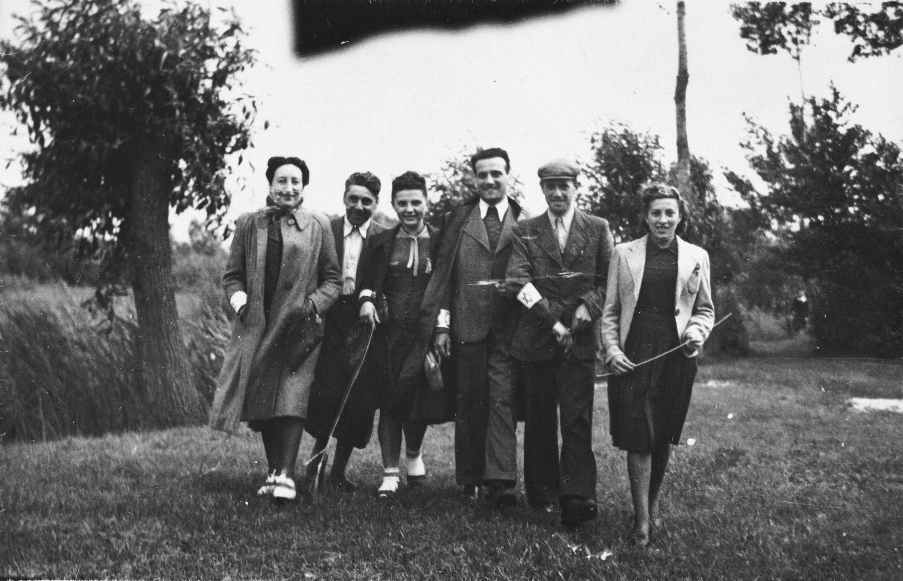 Members of the Jewish Council in Chmielnik journey to Wislica to attend a meeting.

Bluma Kleinhandler is pictured third from the right.