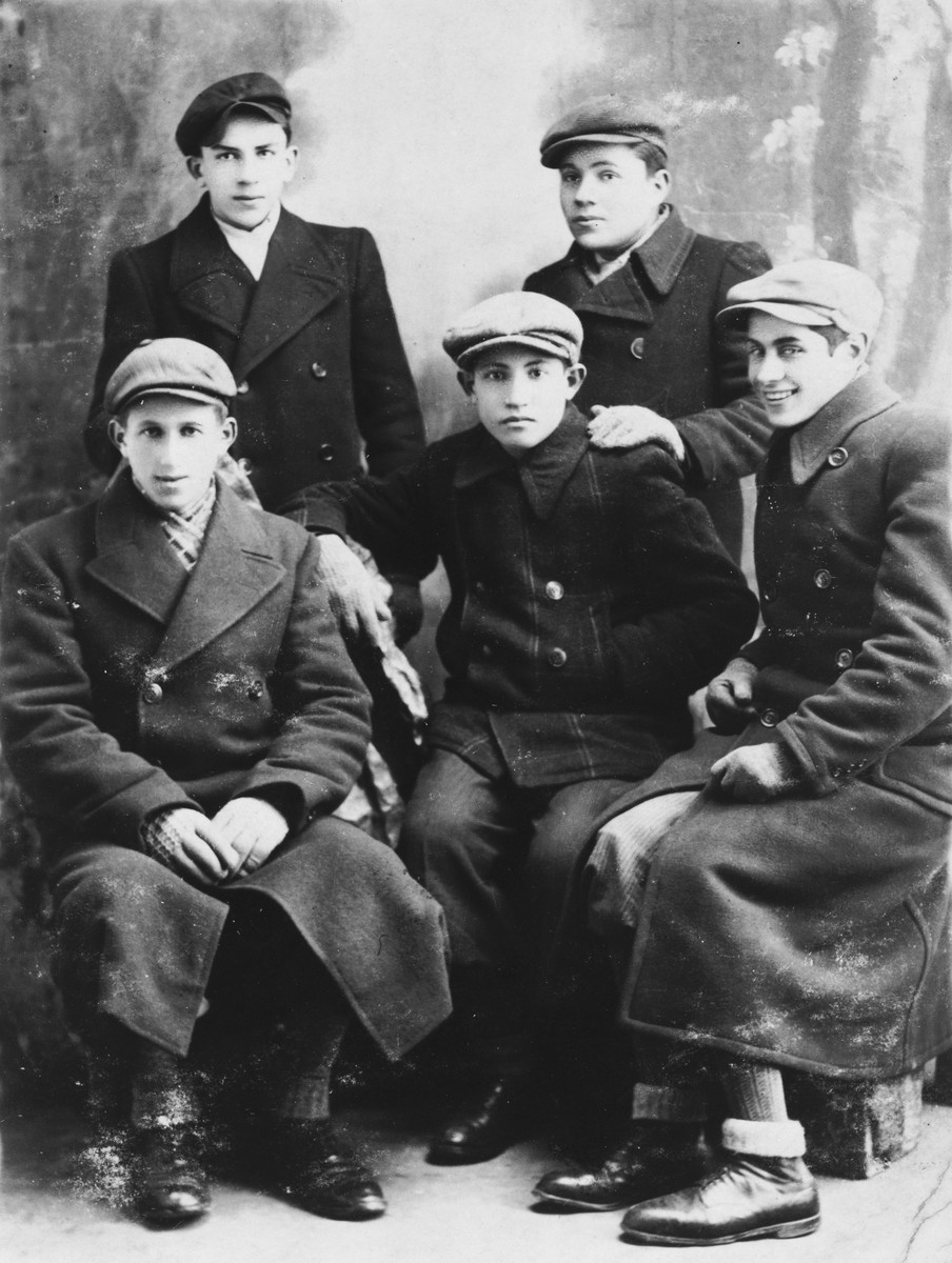 Group portrait of five young Jewish male friends in Chmielnik, Poland.

Among those pictured is Kalman Kleinhandler (top right).