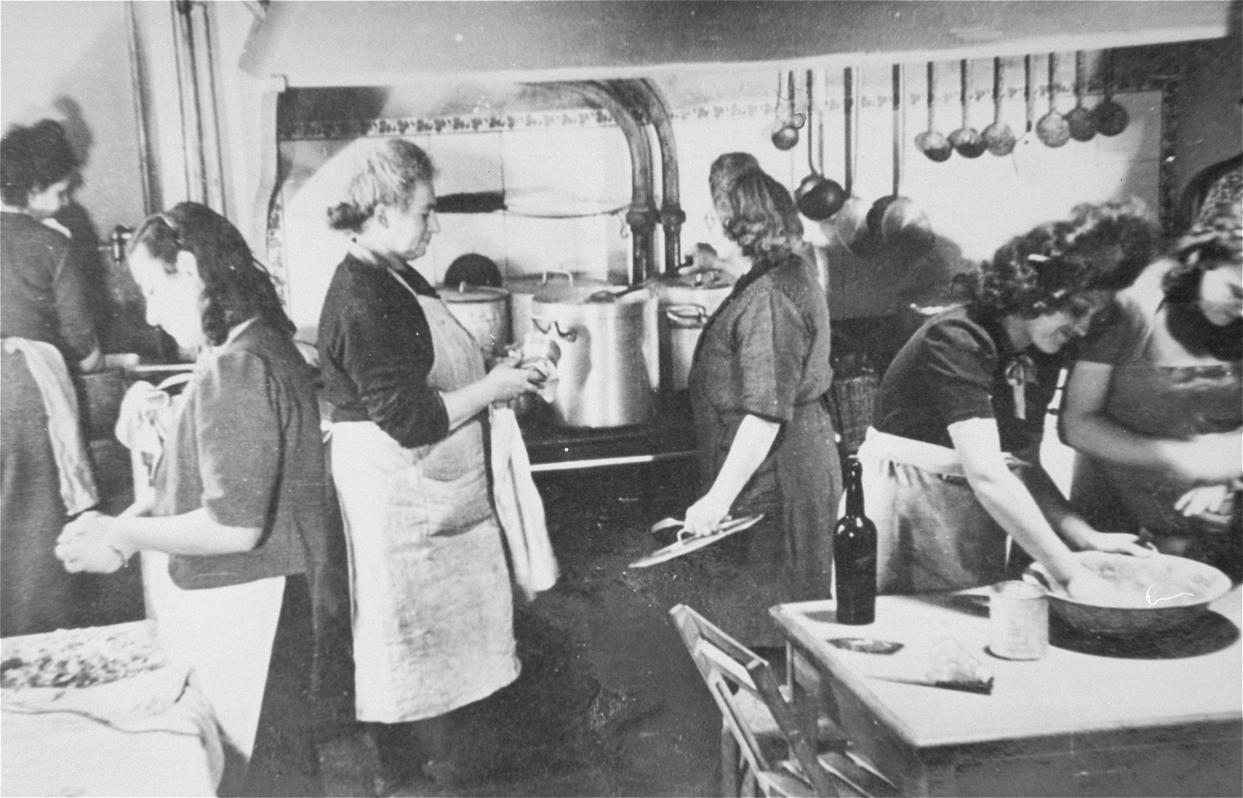 Women at work in the kitchen of the Le Tremplin children's home.