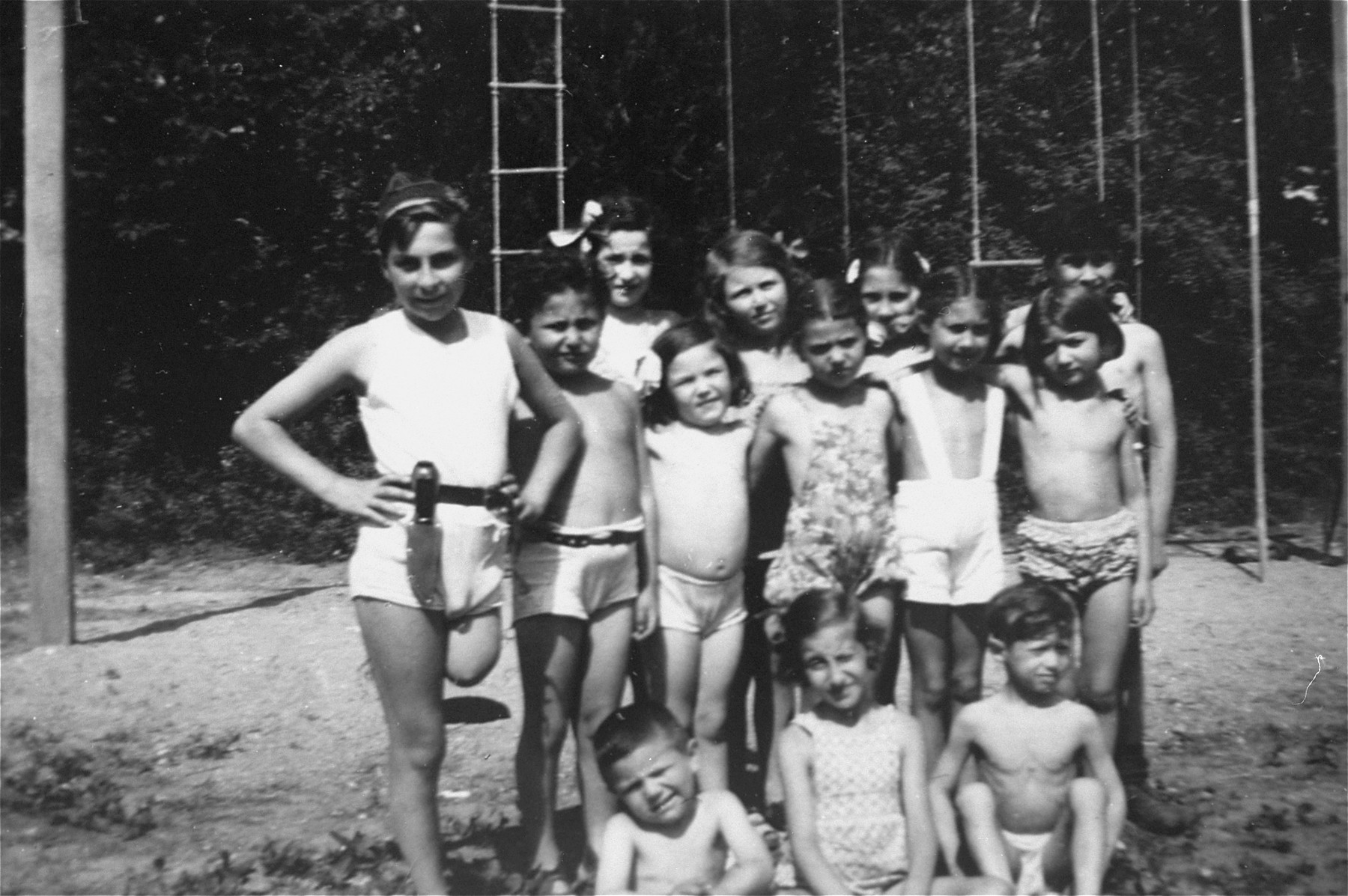 Group photograph taken at an orphanage for Jewish children in Verneuil. 

Among these children is Evi Weisz.