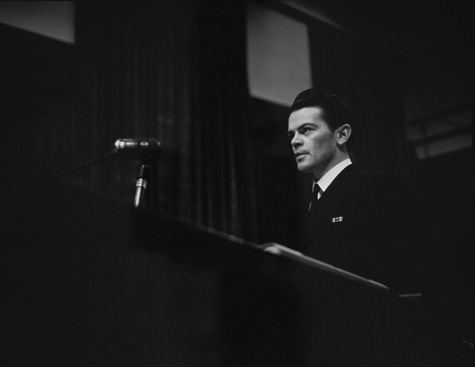 U.S. Assistant trial counsel Lt. Thomas F. Lambert, Jr. presents the prosecution's case against Martin Bormann at the International Military Tribunal for war criminals at Nuremberg.