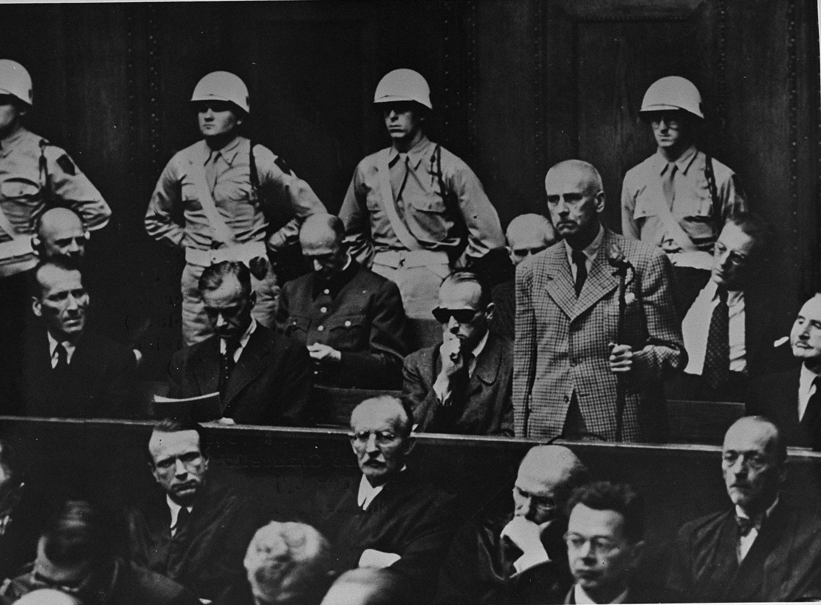 Defendant Wilhelm Frick stands in the dock at the International Military Tribunal trial of war criminals at Nuremberg.
