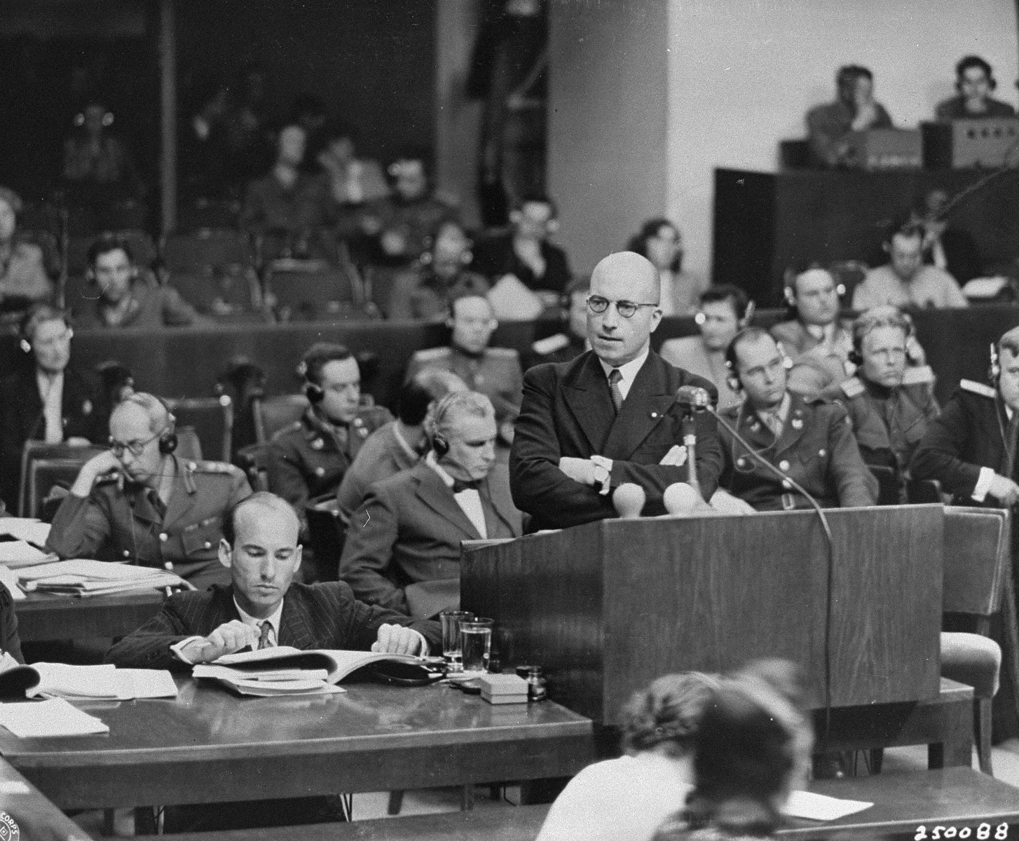 Deputy Chief Prosecutor Charles Dubost presents the French prosecution's final statement at the International Military Tribunal trial of war criminals at Nuremberg.