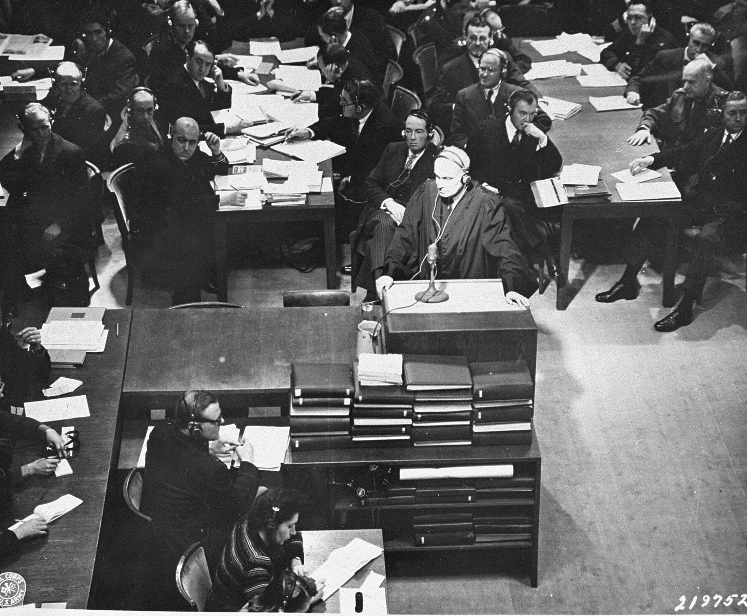 Defense attorney Dr. Otto Stahmer, the counsel for Hermann Goering, asks for a temporary adjournment so the defendants can speak with their counsellors at the International Military Tribunal trial of war criminals at Nuremberg.  As a result, court was adjourned for fifteen minutes.