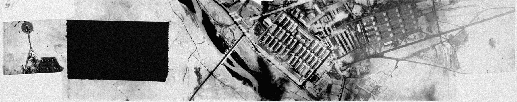 An aerial reconnaissance photograph showing Auschwitz I  including the barracks and administration building.