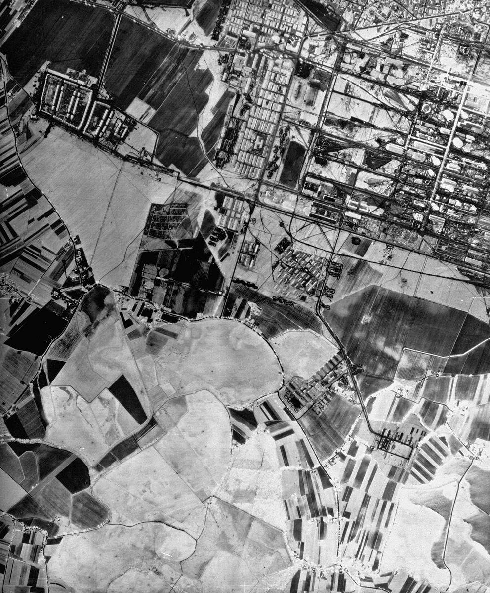 An aerial reconnaissance photograph showing the I.G. Farben "Buna" plant at Auschwitz on the left, with the Auschwitz III (Monowitz) prisoners camp. Camp numbers VII, Lehringsheim, III, VIII and IX  are shown as well, all under construction.