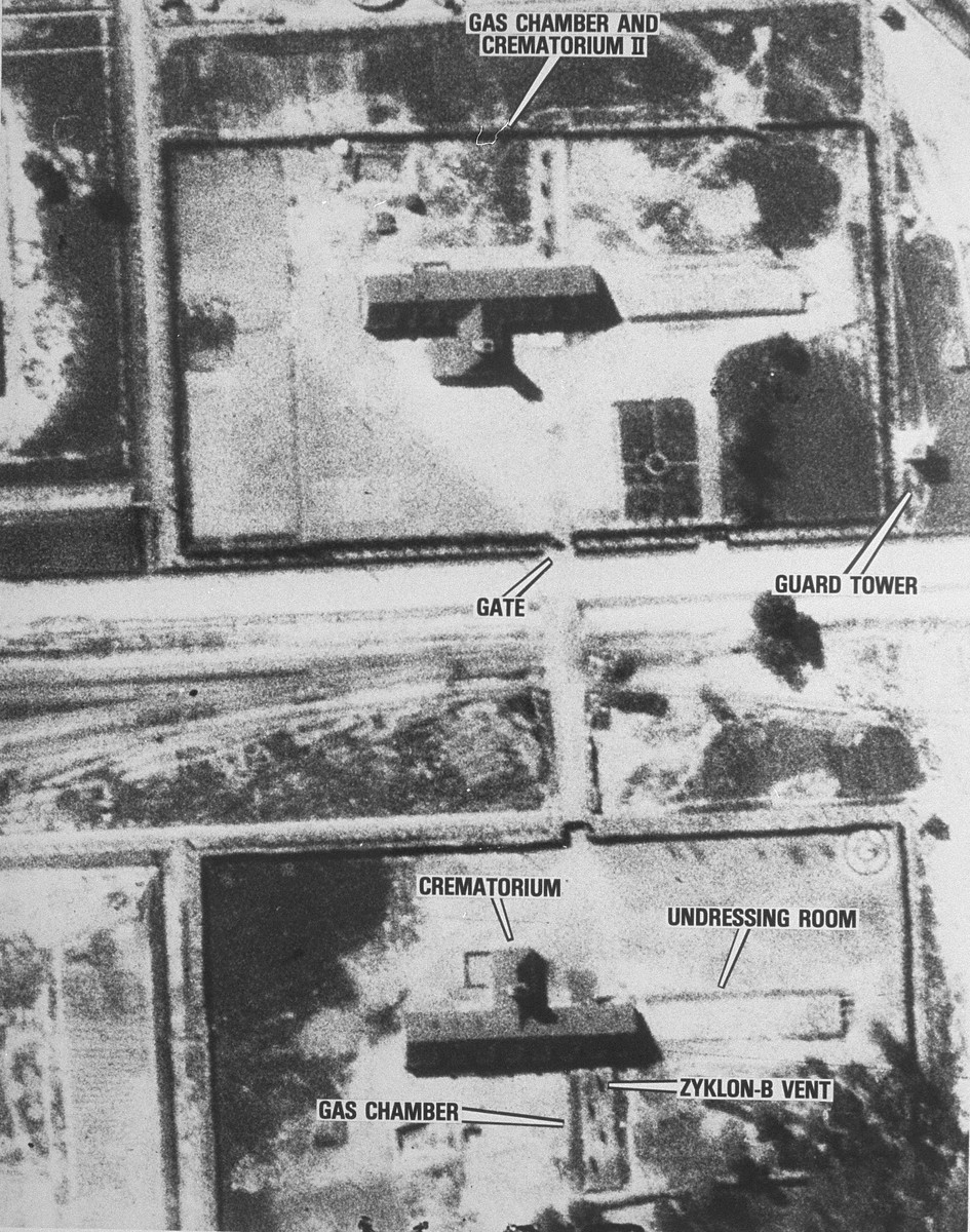 An aerial reconnaissance photograph of Auschwitz II (Birkenau) showing crematoria IV and V, gas chambers and undressing rooms.  [oversized photograph]

Also identified as Crematoria II and III.
