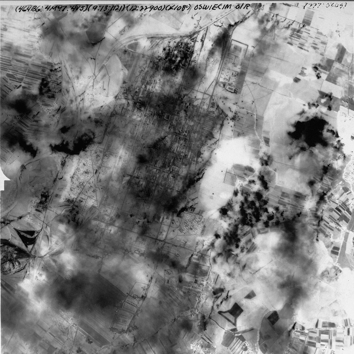 An aerial reconnaissance photograph showing the I.G. Farben complex in Auschwitz.  [oversized photograph]