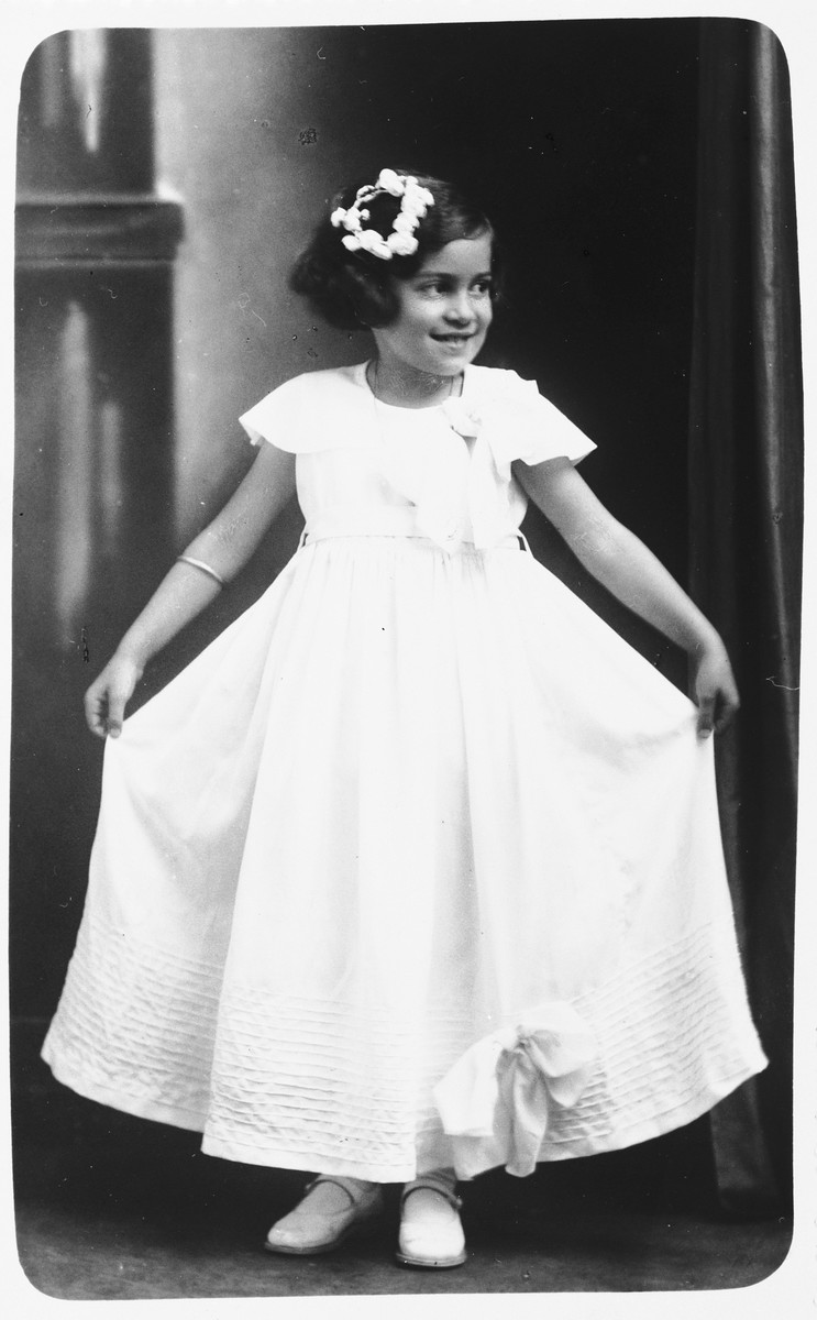 Portrait of a young Jewish girl wearing a fancy party dress in Ludbreg, Croatia.

Pictured is Zdenka Apler.