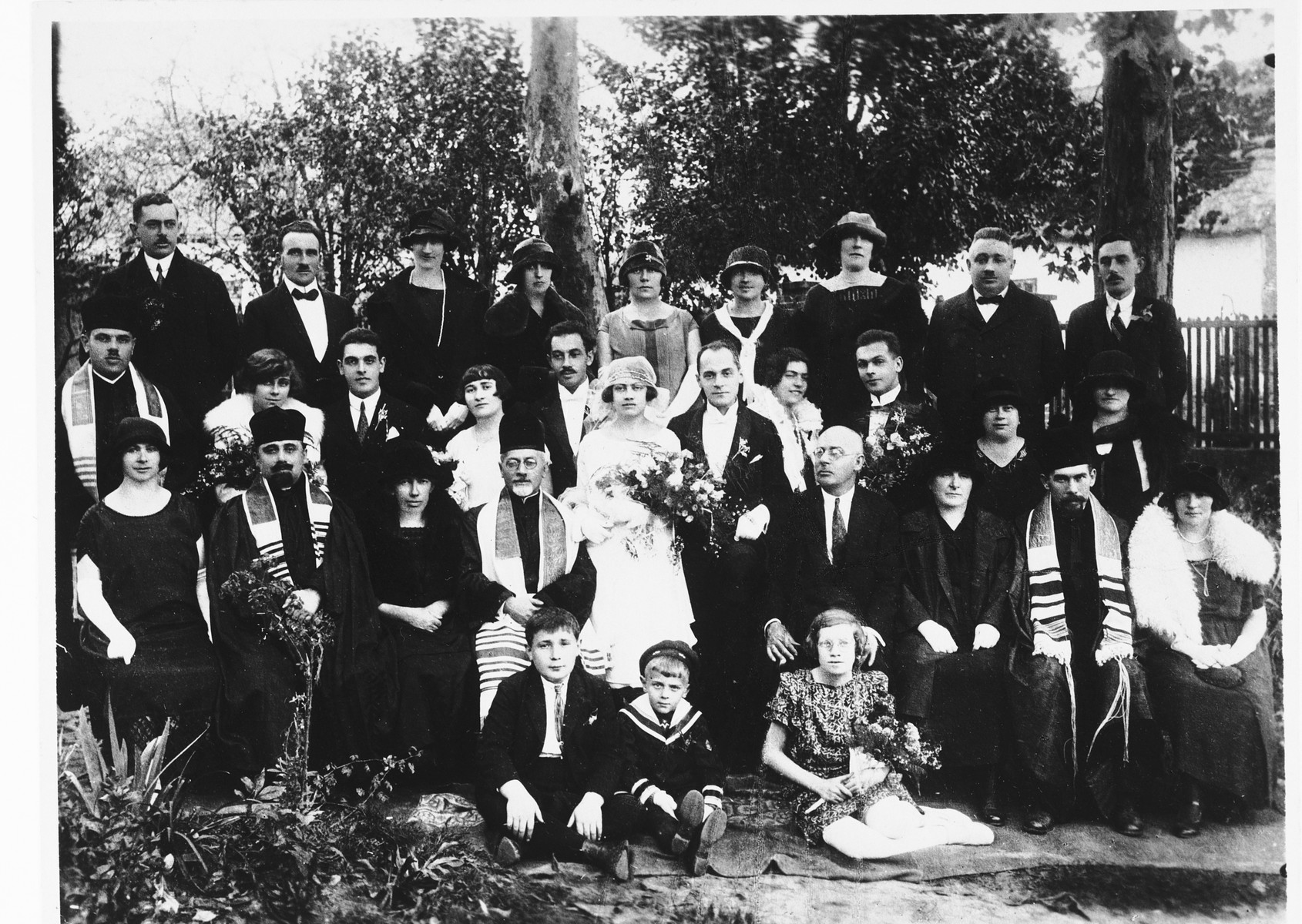 Group portrait of family and friends at the wedding of a young Jewish couple, Blanka Deutsch and Rudi Apler, in Ludbreg, Croatia.