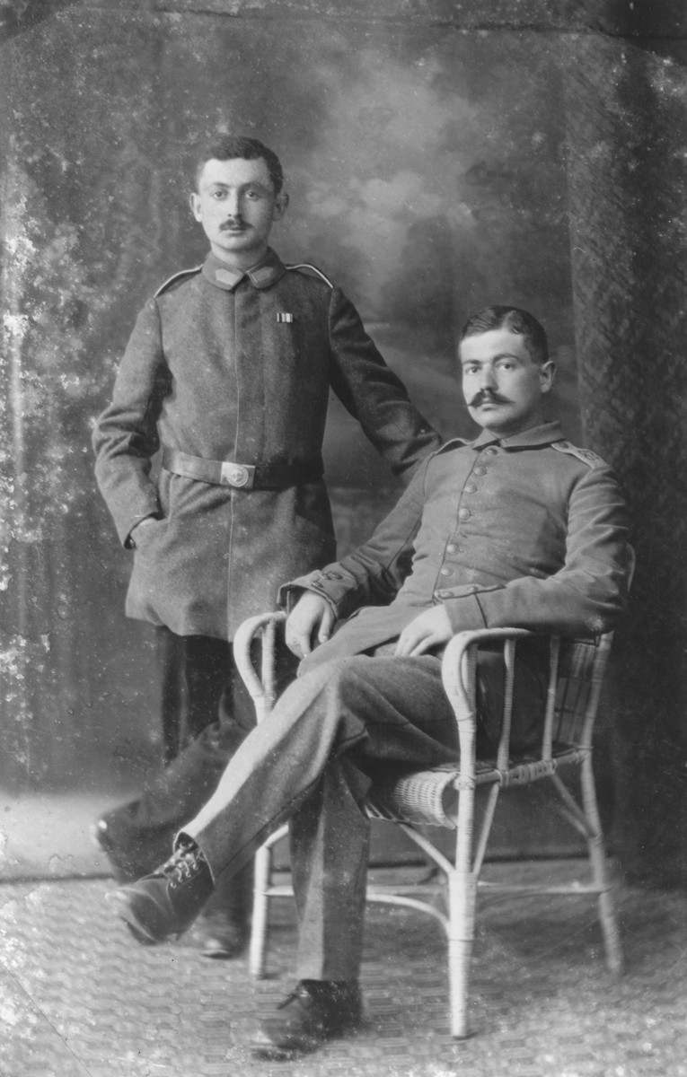 Studio portrait of two German Jewish soldiers during World War I. 

The soldiers were cousins of the donor Werner Mendel.