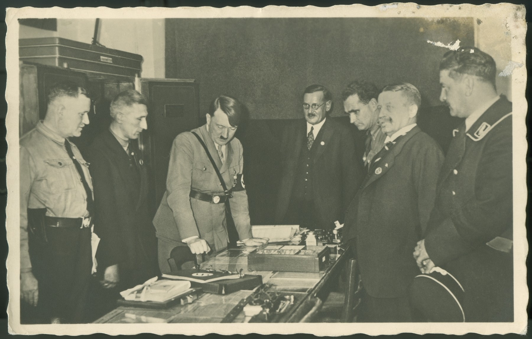 Adolf Hitler and other dignitaries at the opening of the Nazi Party museum in the Sterneckerbraeuhaus, which had been the Party's first headquarters.