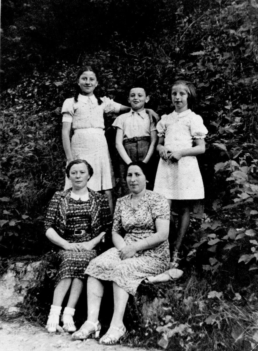 Members of the Goldman family pose with friends at a spa in Poland.  

Pictured seated from left to right are: Cyla Goldman and Mrs. Kleinkopf.  Standing in the back from left to right are: Rachela Goldman, ? Kleinkopf and Hania Goldman.