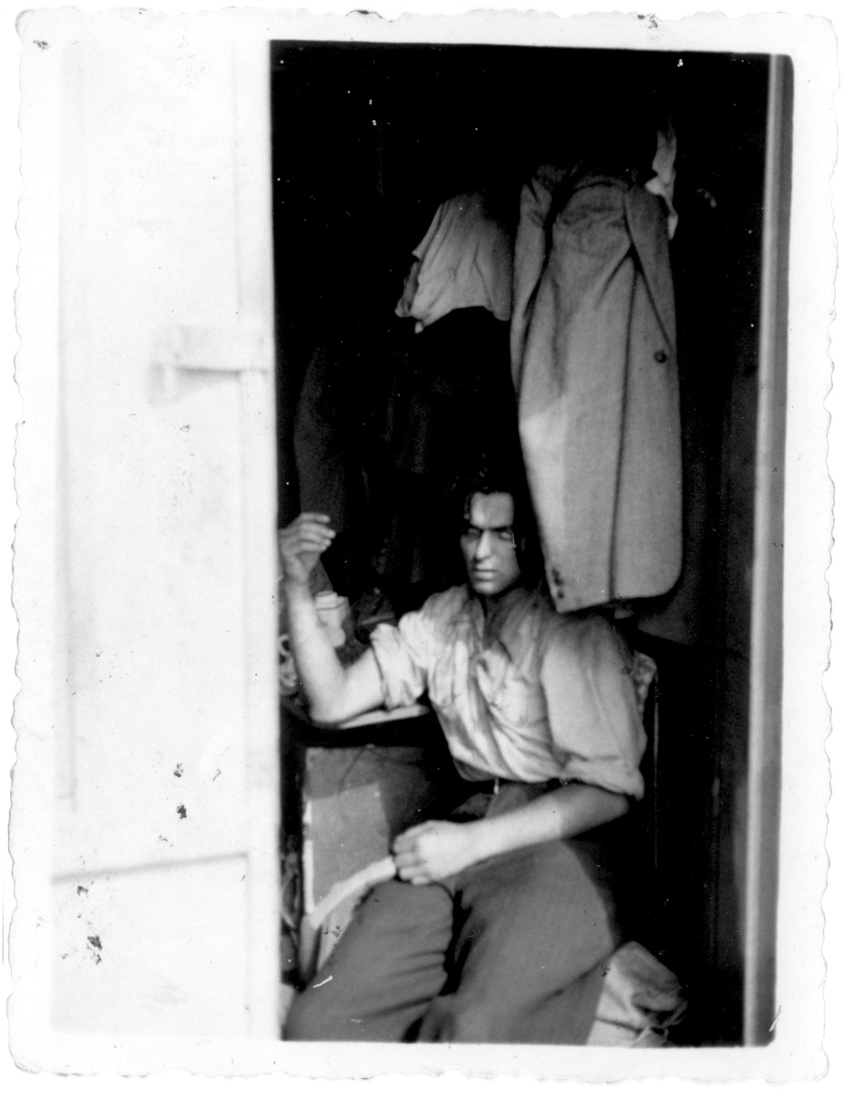 After the battle with the British boarding party, an injured passenger awaits treatment aboard the Exodus 1947.