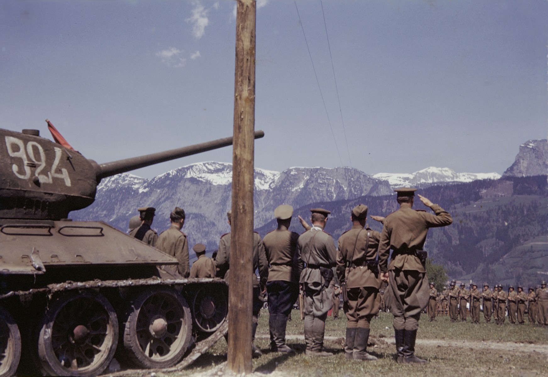 Members of the U.S. 9th Armored Division meet up with units of the Red Army near Linz, Austria.