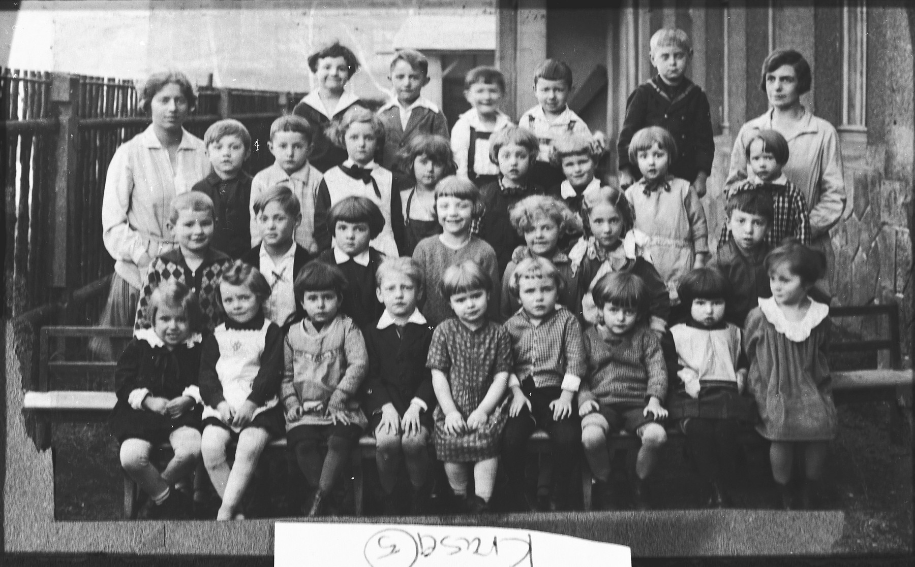 Group portrait of Czech and Jewish pupils in an elementary school in Prague.

Among those pictured is Edgar Krasa (second row from the front, second from the left).