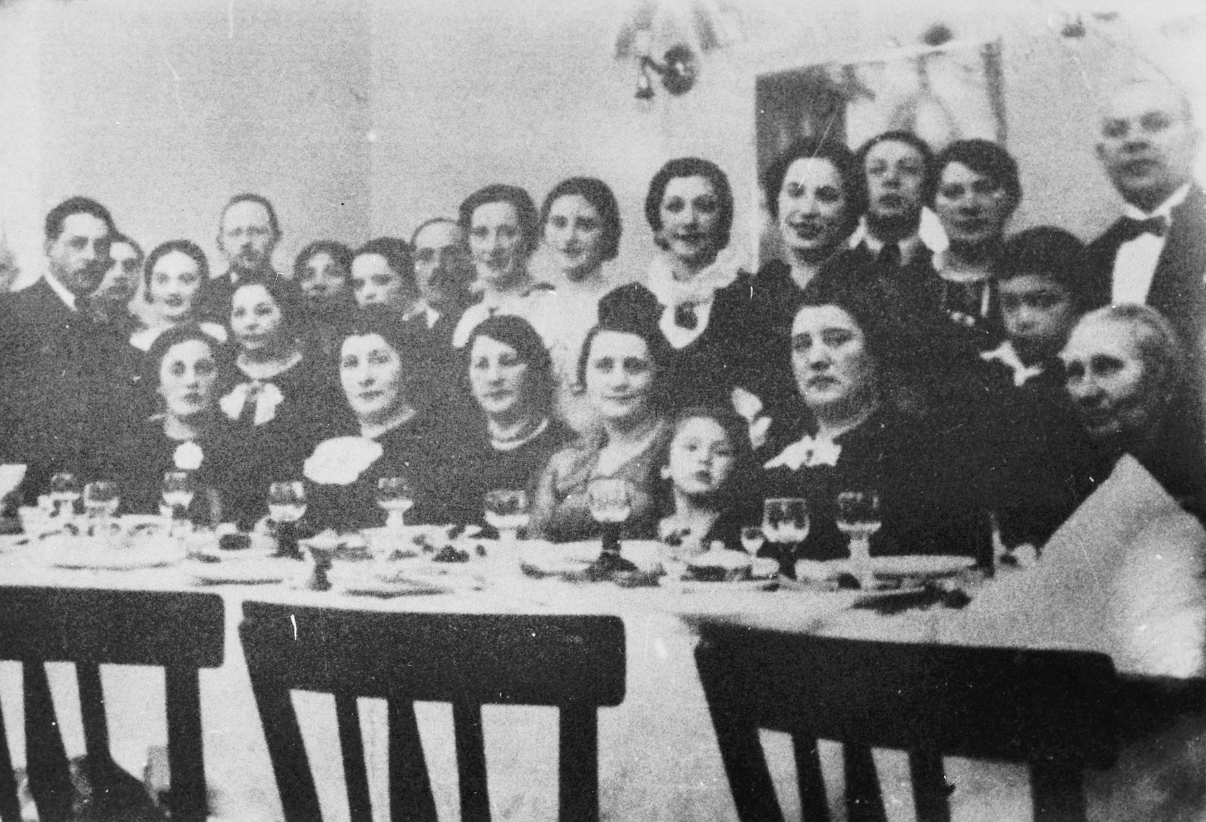 Portrait of the extended Pfefferberg family.

Mina Pfefferberg is seated second from the right.  Everyone in the photograph perished.