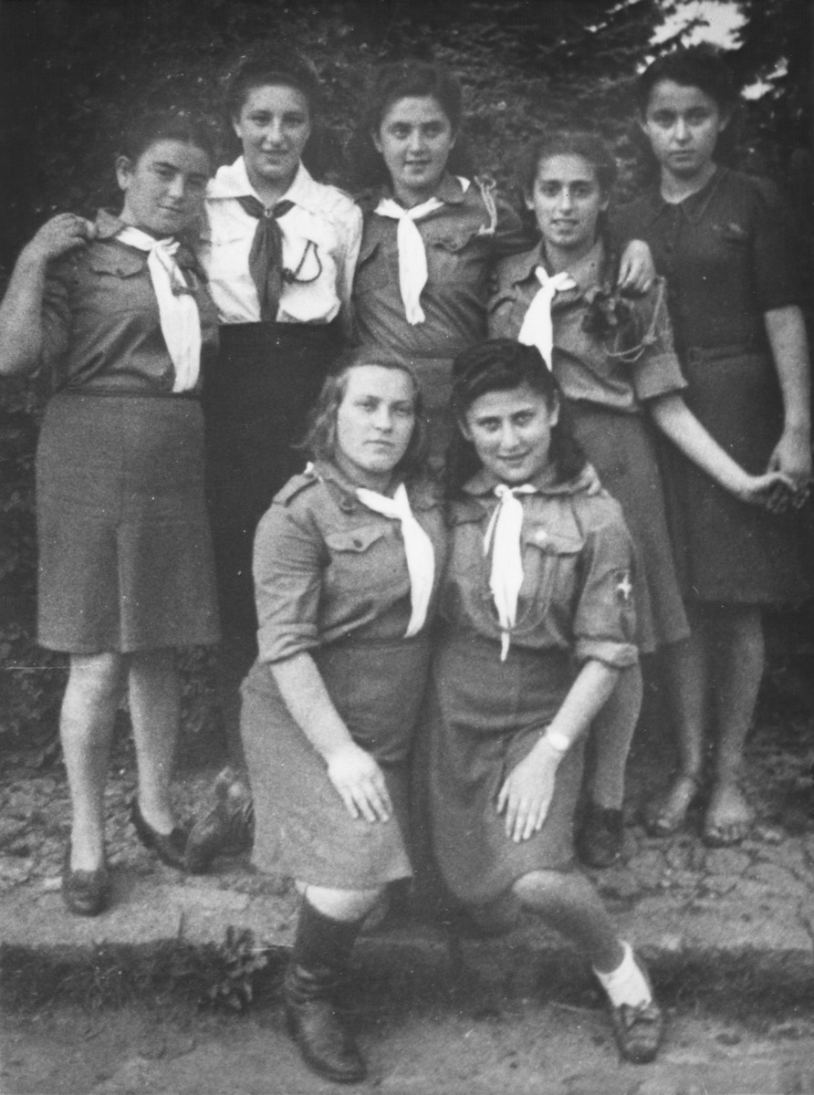 Group portrait of girls wearing the uniform of a Zionist youth movement in the Selvino children's home.