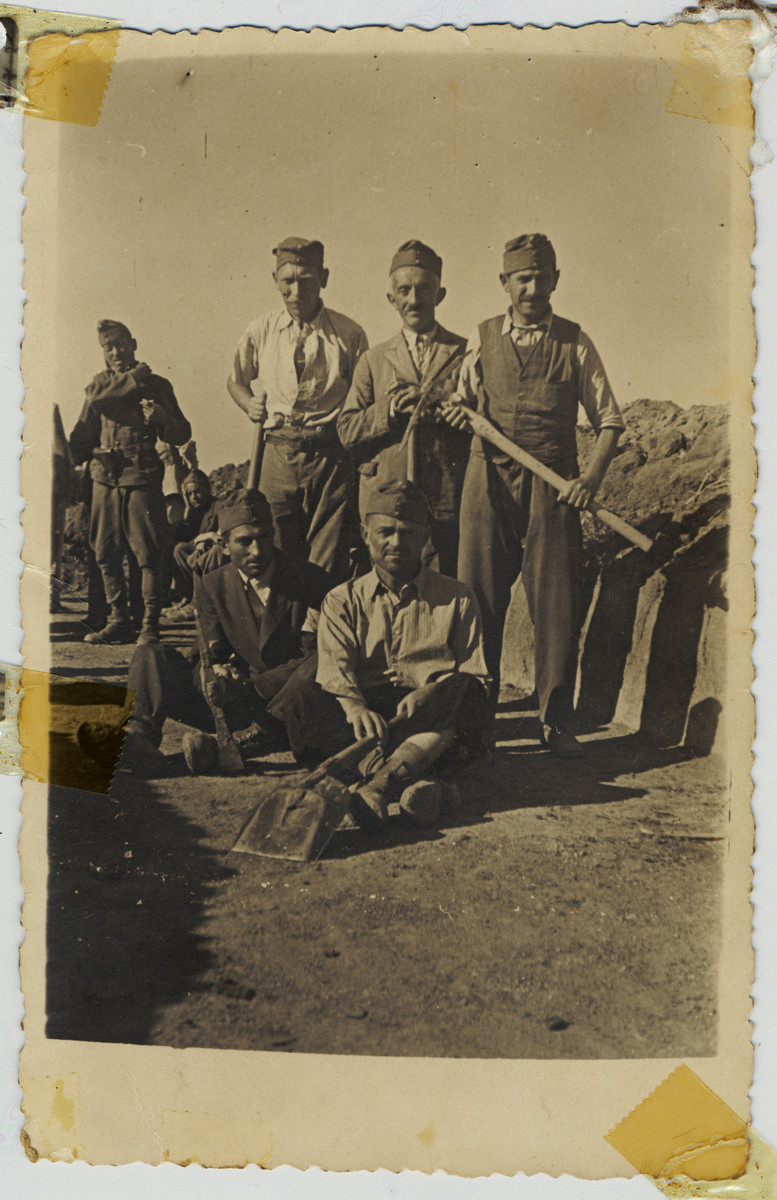 A group of Hungarian Jewish men pose with shovels in a Hungarian labor battalion.

Among those pictured is Chaskel Ehrenreich, uncle of the donor.  He and all of his family perished in the Holocaust.