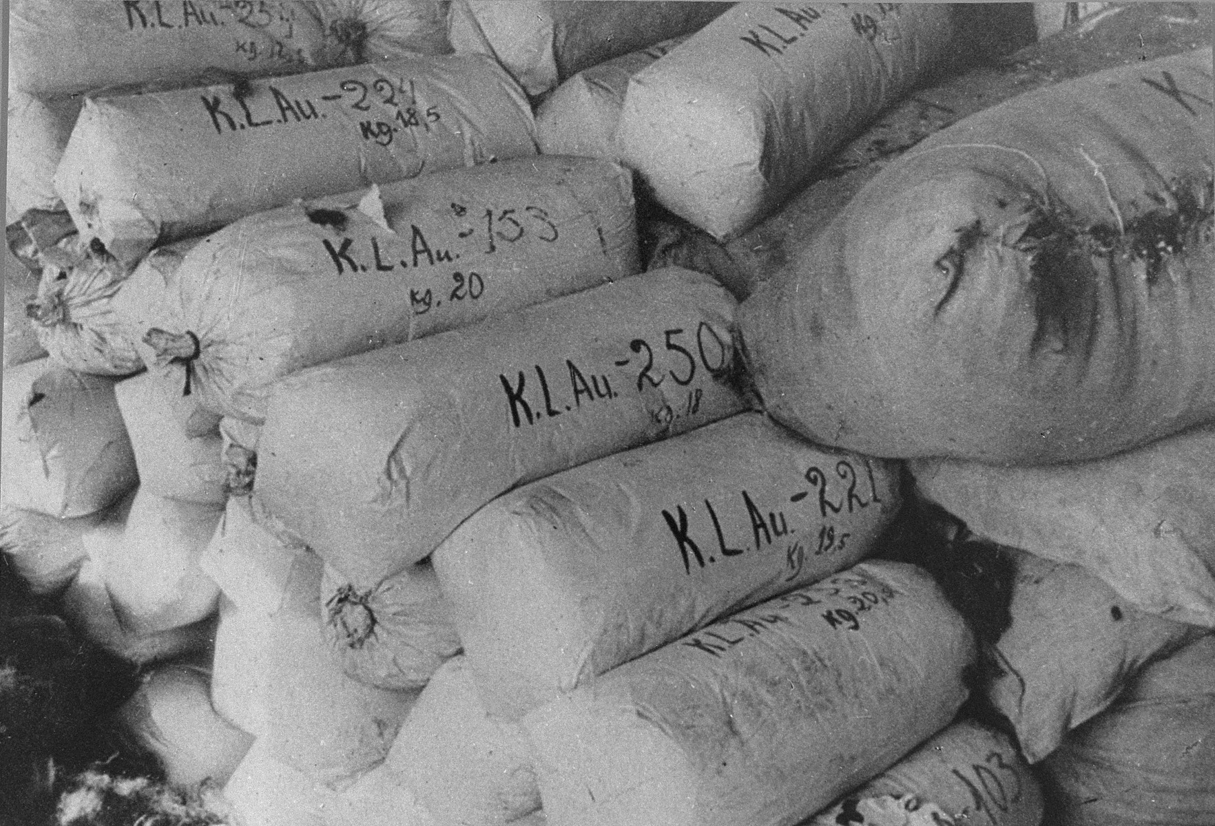 Bales of hair from female prisoners, numbered for shipment to Germany, found at the liberation of Auschwitz.