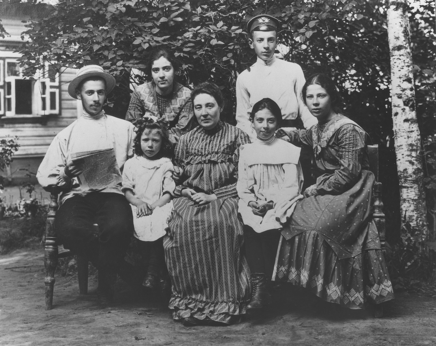 Portrait of the Mikolaevsky family at their dacha in the village of Strelna, a suburb of St. Petersburg.