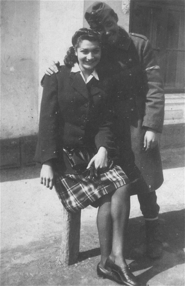 Portrait of an engaged Jewish couple in Cluj.  

Pictured are Jolande Markovits (the donor's sister) and Bela Blau.  Blau was on leave from his Hungarian labor battalion.  Blau survived the labor battalion and deportation to Auschwitz.  Jolande perished in Auschwitz.

The donor, Andre Markovits, who was liberated from Buchenwald, returned to Cluj after the war and retrieved this photo from the photographic studio in which it was taken in 1943.  Andre was the sole survivor of his family, who were all deported from the Cluj ghetto to Auschwitz in April, 1944.