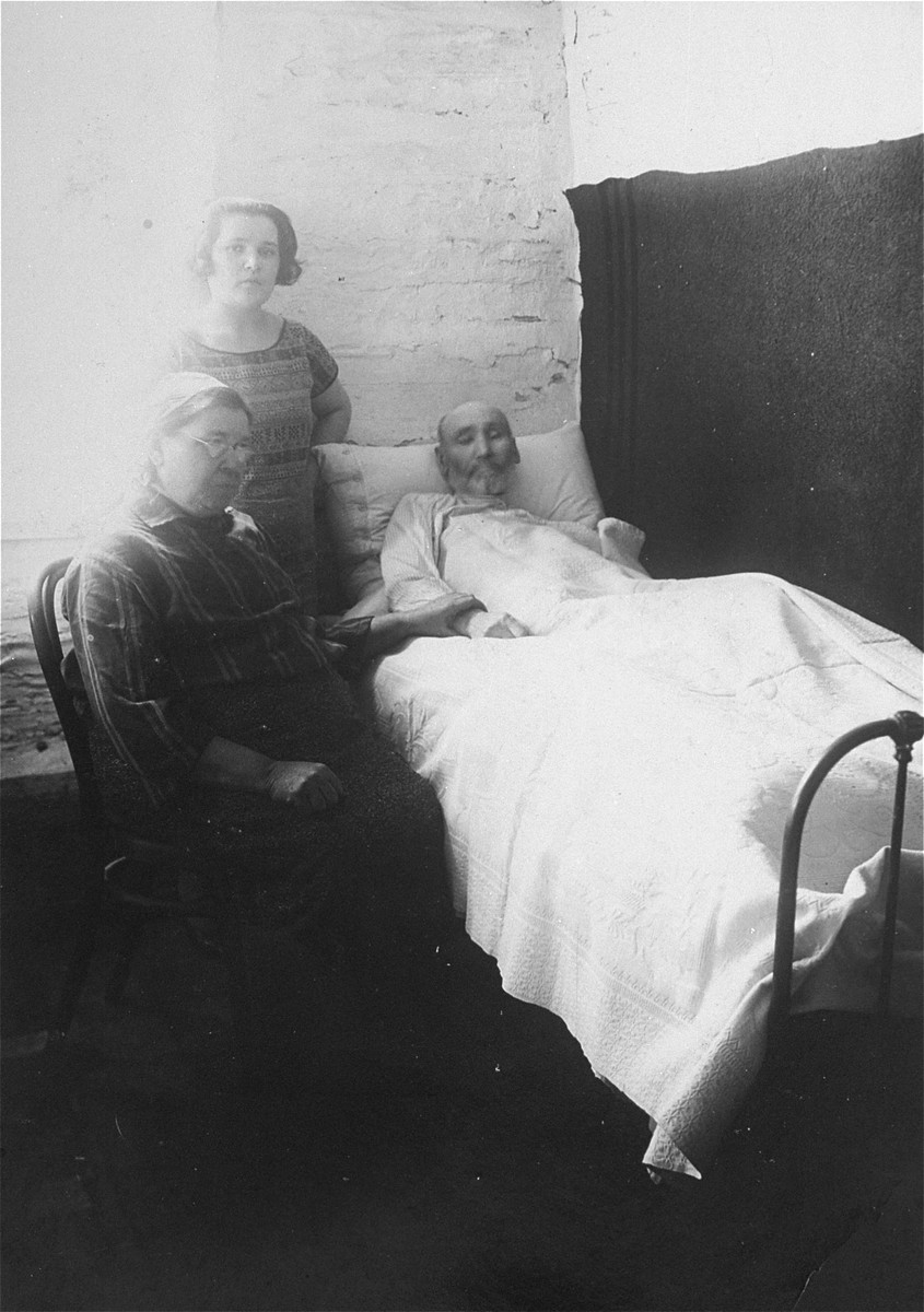 Portrait of the donor's mother, Chaya Gar, visiting her sick father in the hospital, along with her mother.