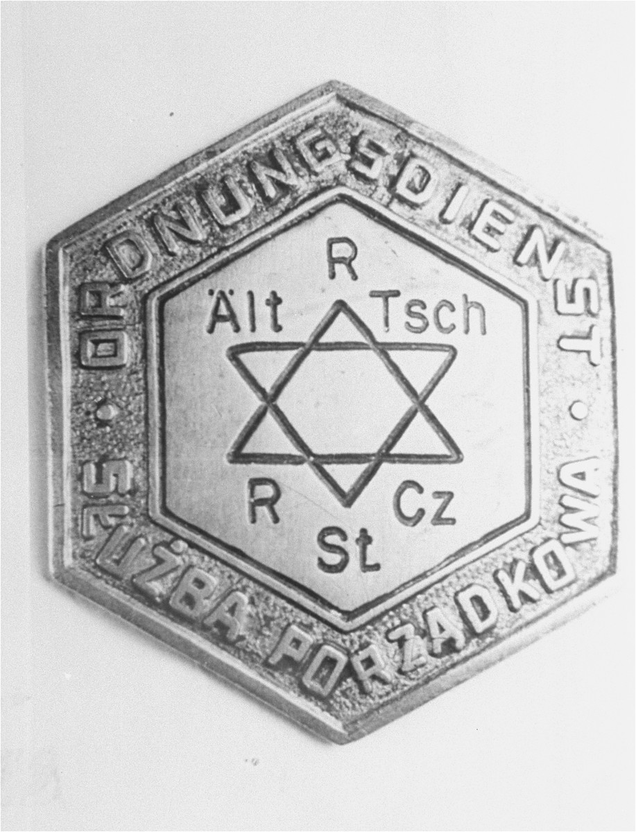 Metal badge of a Jewish policeman in the Czestochowa ghetto.