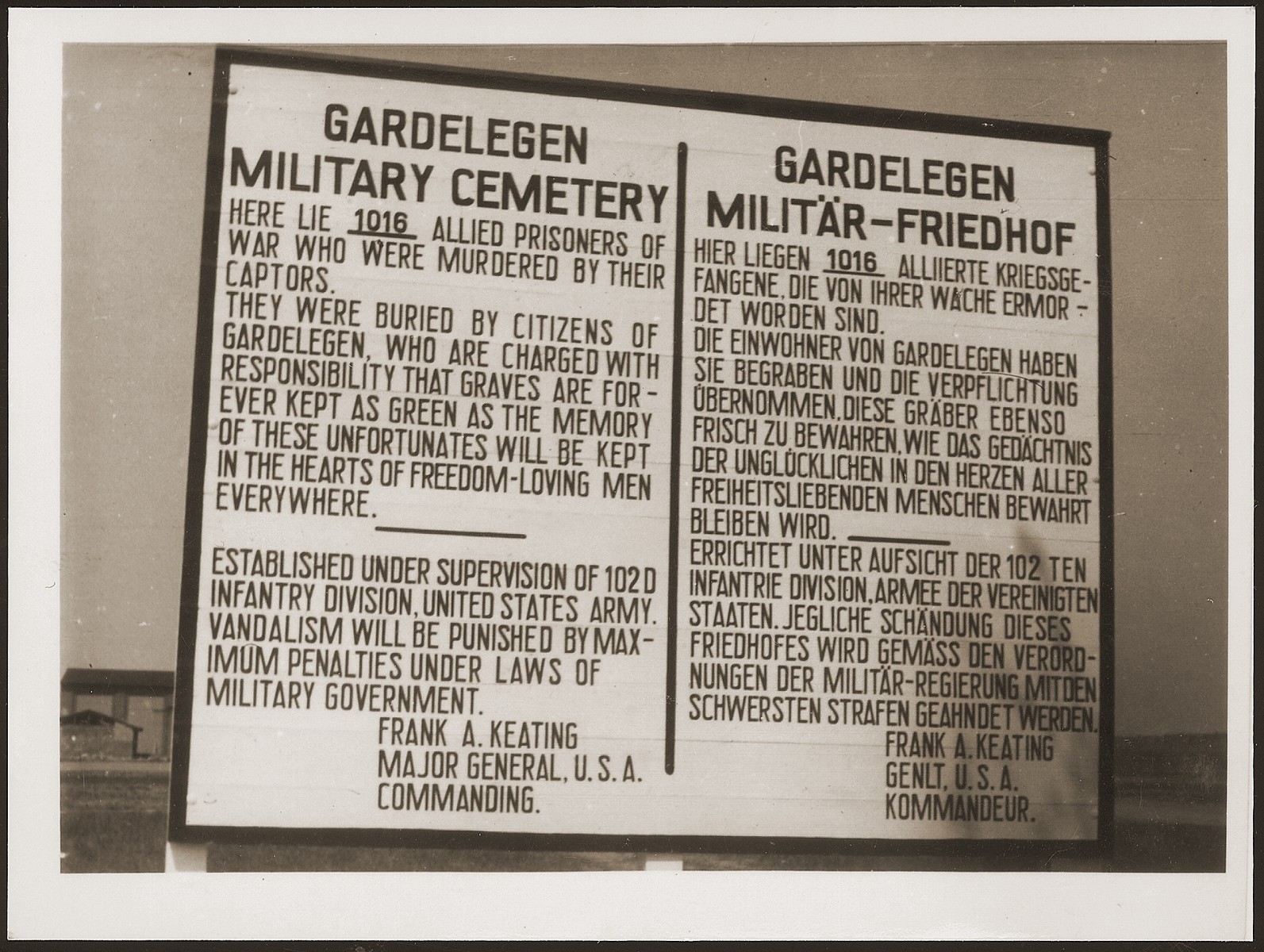 A sign erected at the Military Cemetery in Gardelegen in memory of 1,016 prisoners who were killed by the SS in a barn near the town.