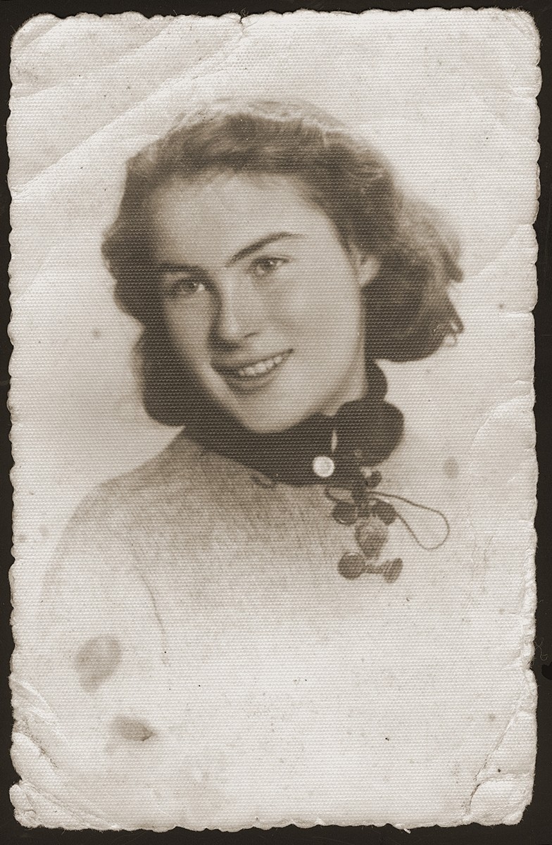 Studio portrait of Genia Dunski, a young Jewish woman in the Sosnowiec ghetto.