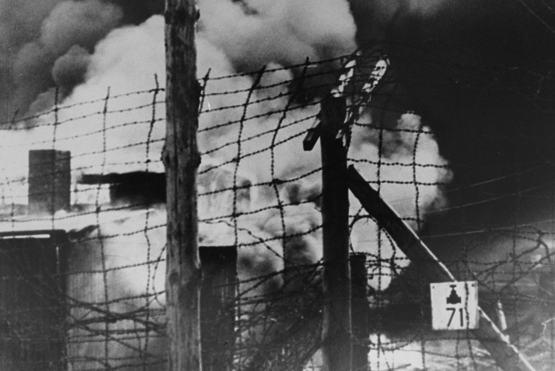 View of the burning barracks in camp no. 1 in Bergen-Belsen to prevent the spread of typhus.