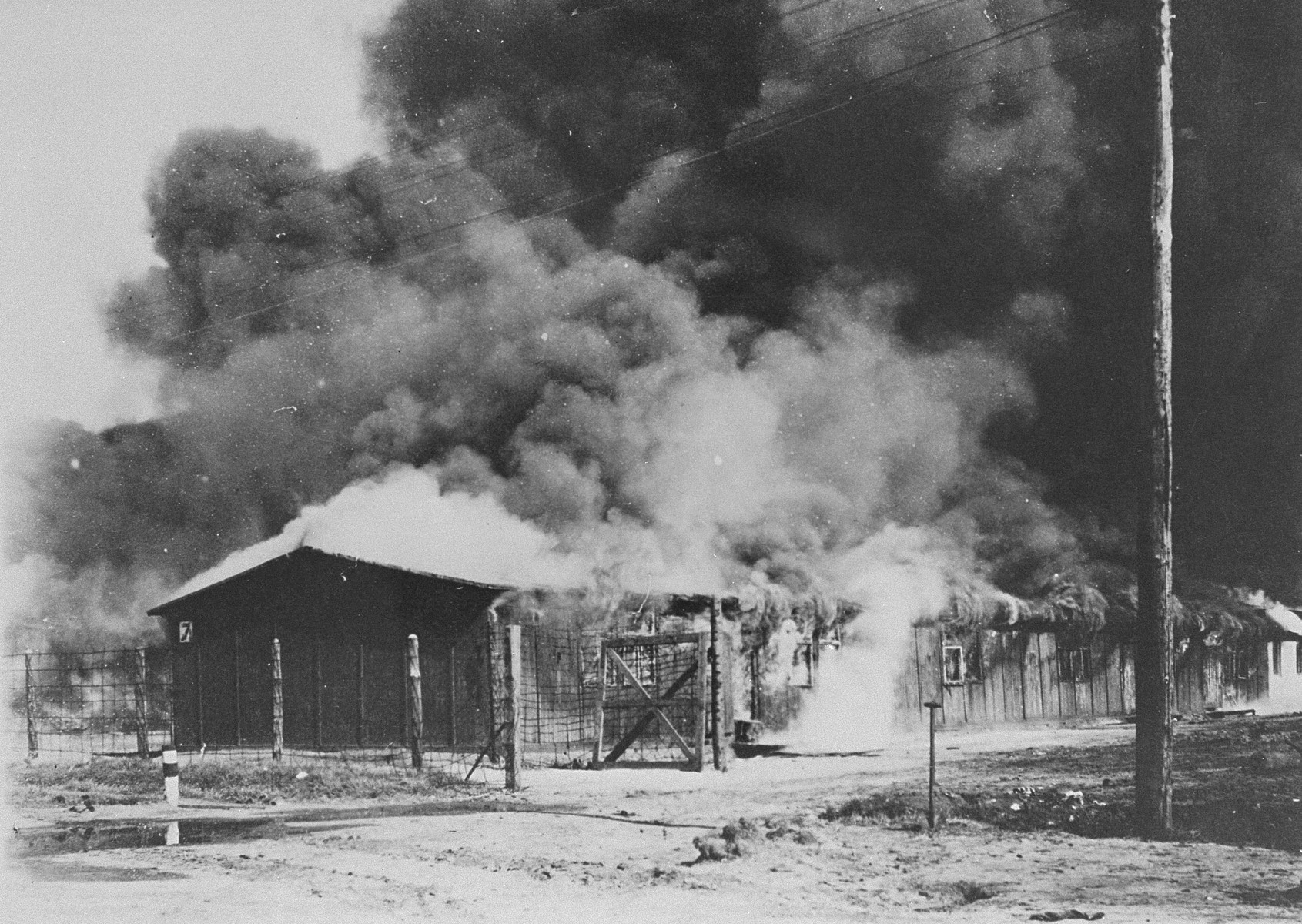 Burning the typhus-infected barracks of camp no. 1 in Bergen-Belsen.