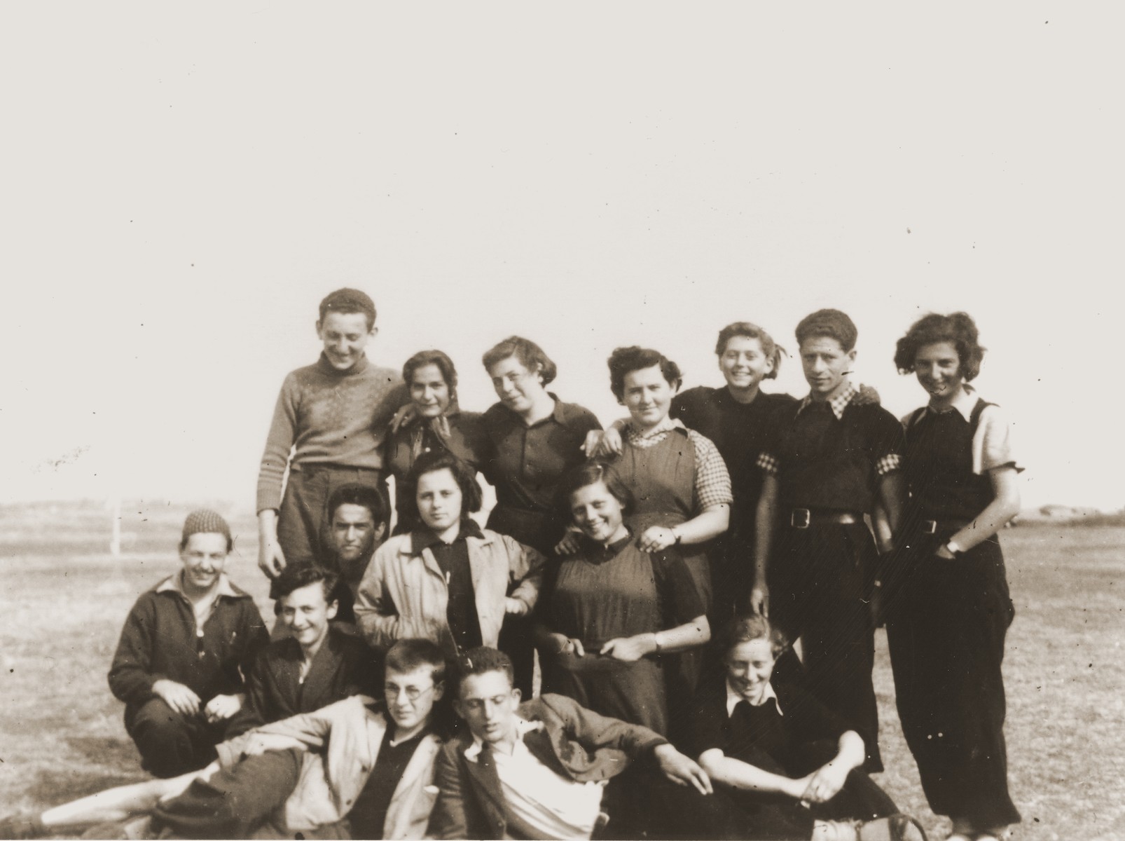 Group portrait of members of the Hashomer Hatzair Zionist youth group from the Kladovo transport.  Erich Nachhaeuser, the group's leader, is pictured standing second from the right.