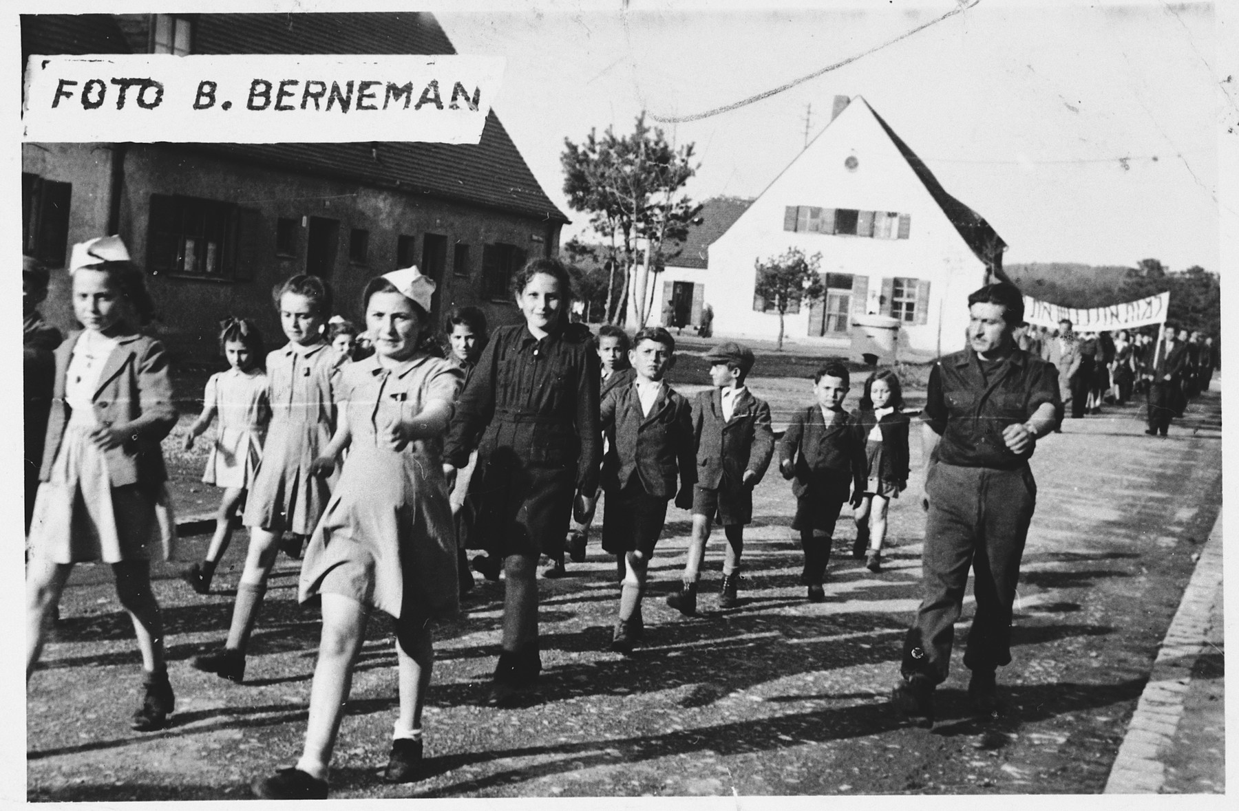 Children in the Foehrenwald displaced persons camp march in a Zionist parade.

Among those pictured is Sonia Dzienciolski.