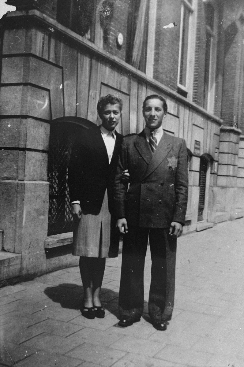 Samuel Schrijver and his fiance, Jetty de Leeuw, pose on a street in the Jewish quarter of Amsterdam.  

Jetty was later deported and perished in a concentration camp.