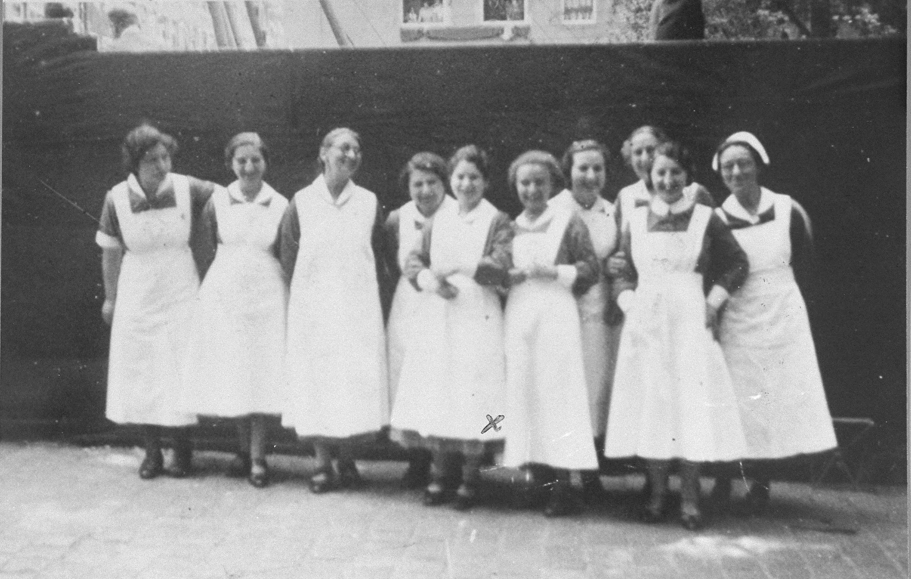Nurses at the Jewish Invalid Hospital in the Jewish quarter of Amsterdam.  Elisabeth Rood is pictured fifth from the left.