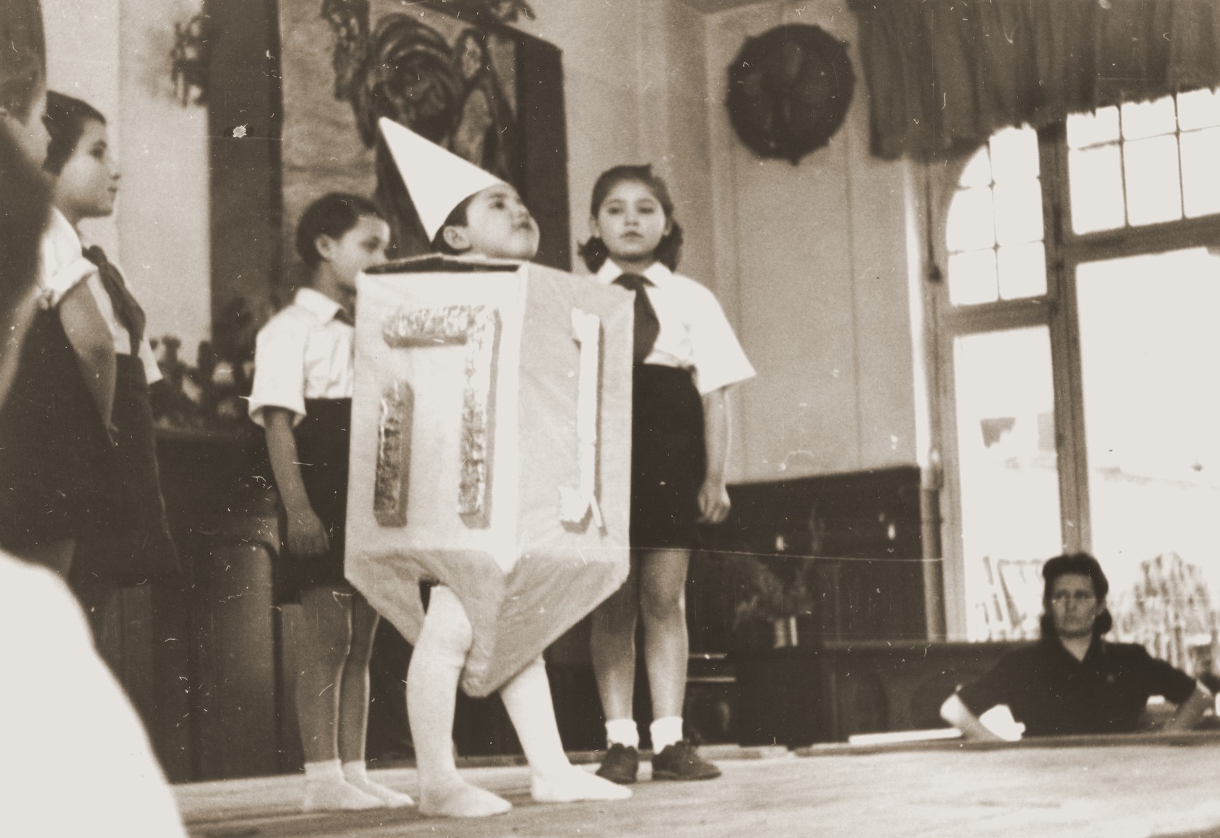 Children perform in a Hannukah pageant in the Lindenfels DP children's center.