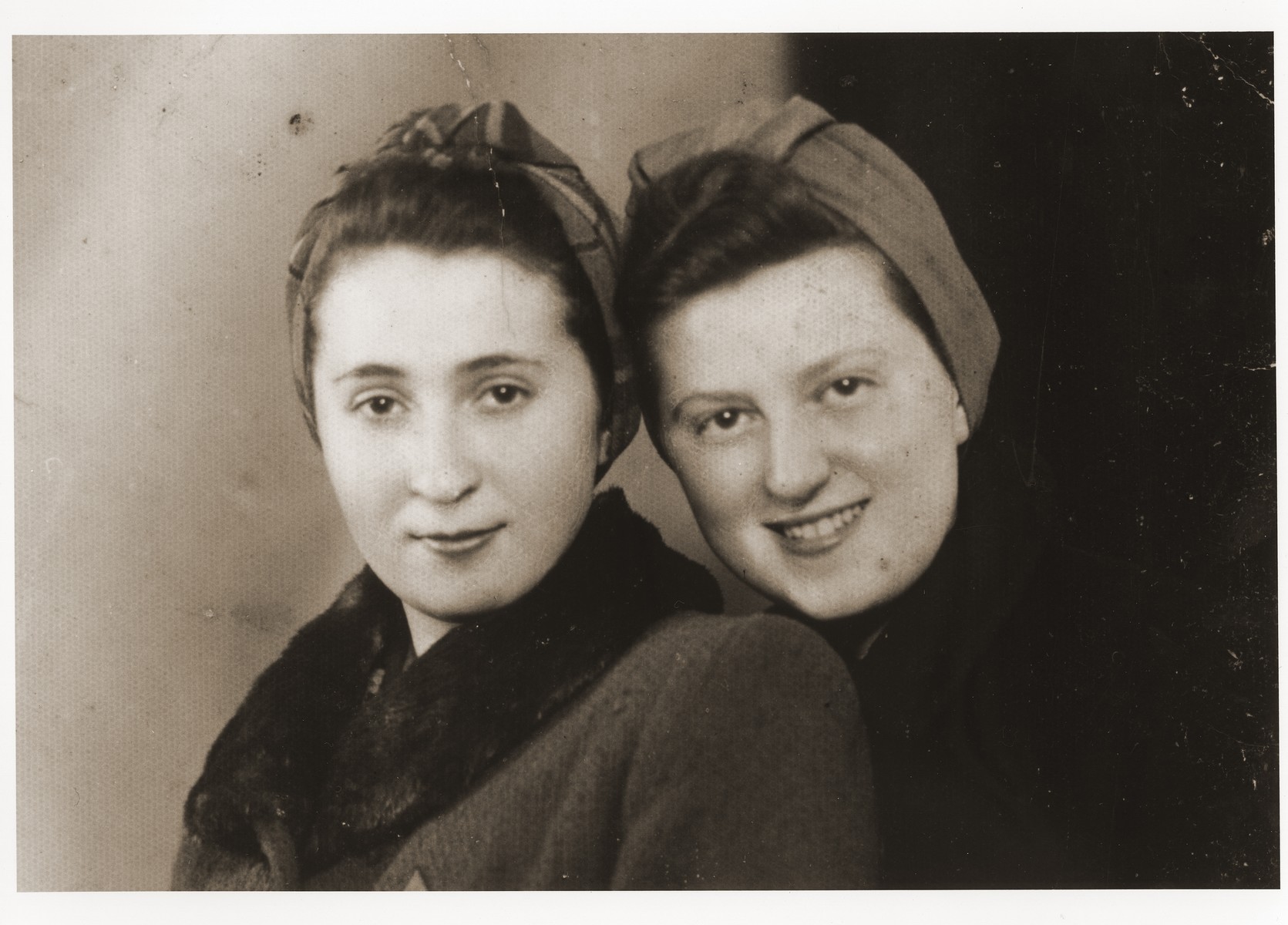 Portrait of two young women in the Dabrowa ghetto.

Pictured on the right is Renia (Zylberszac) Nadel.