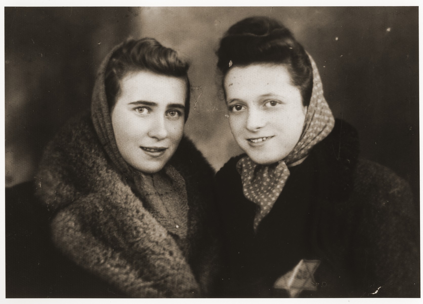 Portrait of two young women in the Dabrowa ghetto.

Pictured on the left is Ala Zylbersztajn.