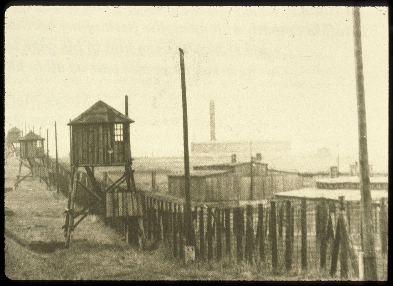 View of the watch towers and fence surrounding the Majdanek concentration camp.