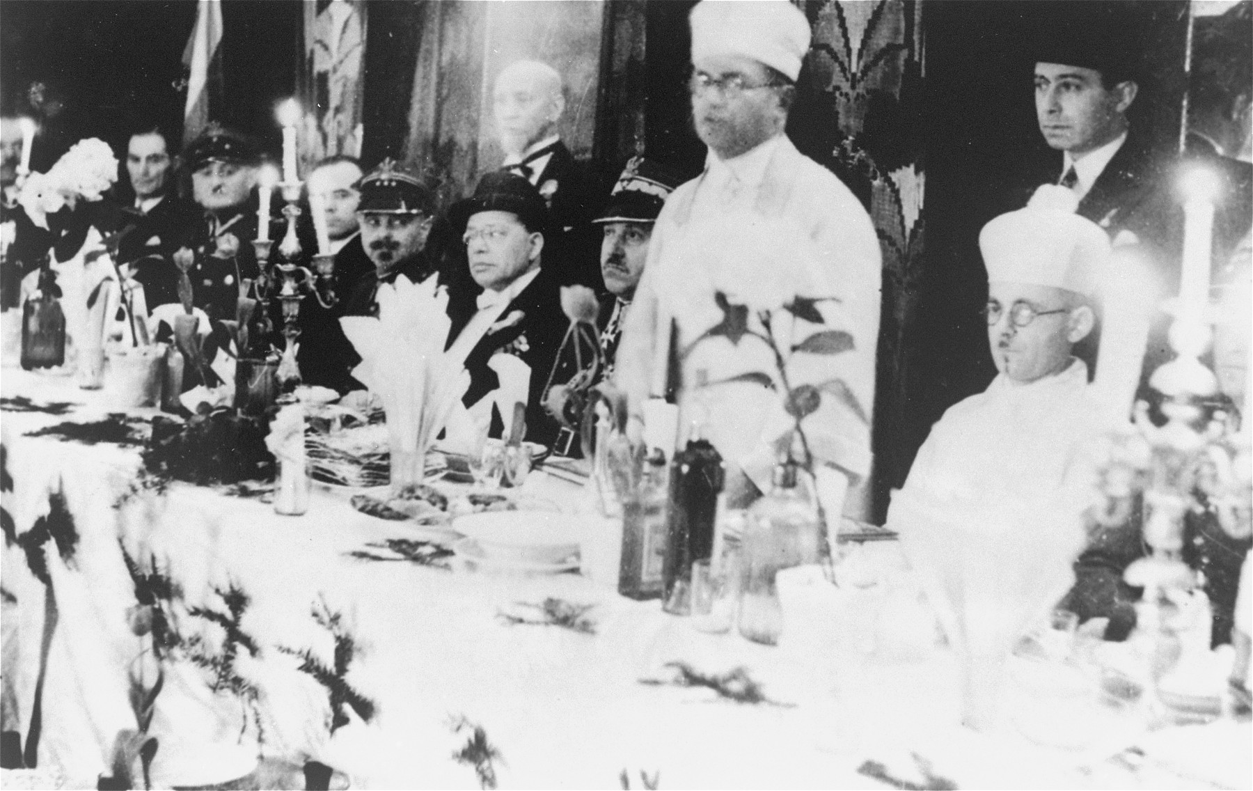 Chief Rabbi of the Polish Army, Boruch Steinberg, leads a Passover seder.

Rabbi Steinberg was later killed in Katyn massacre.
