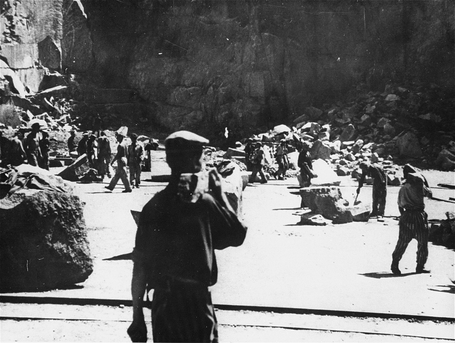 Prisoners at forced labor in the Wiener Graben quarry at the Mauthausen concentration camp.