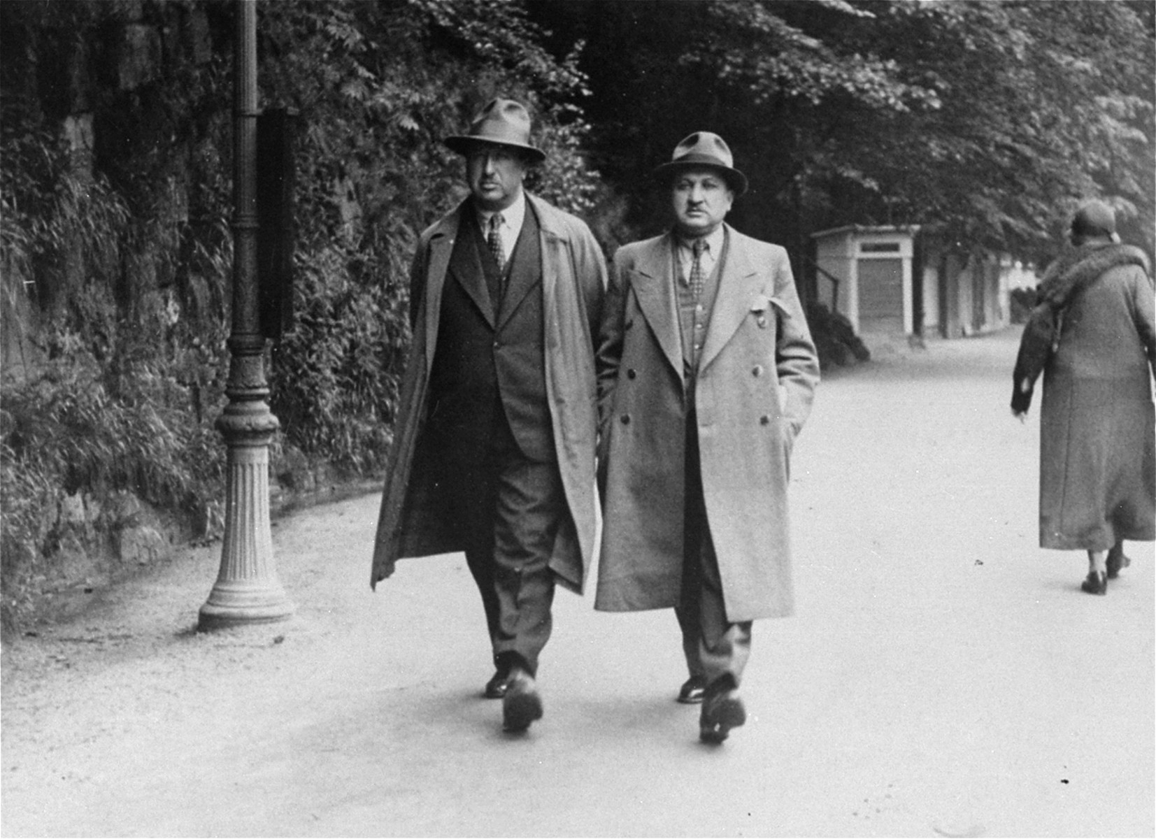Two Jewish men from Romania stroll along a street in the Karlsbad spa.

Pictured are Leon Gutman, Jeanine Gutman's father, with his brother-in-law.