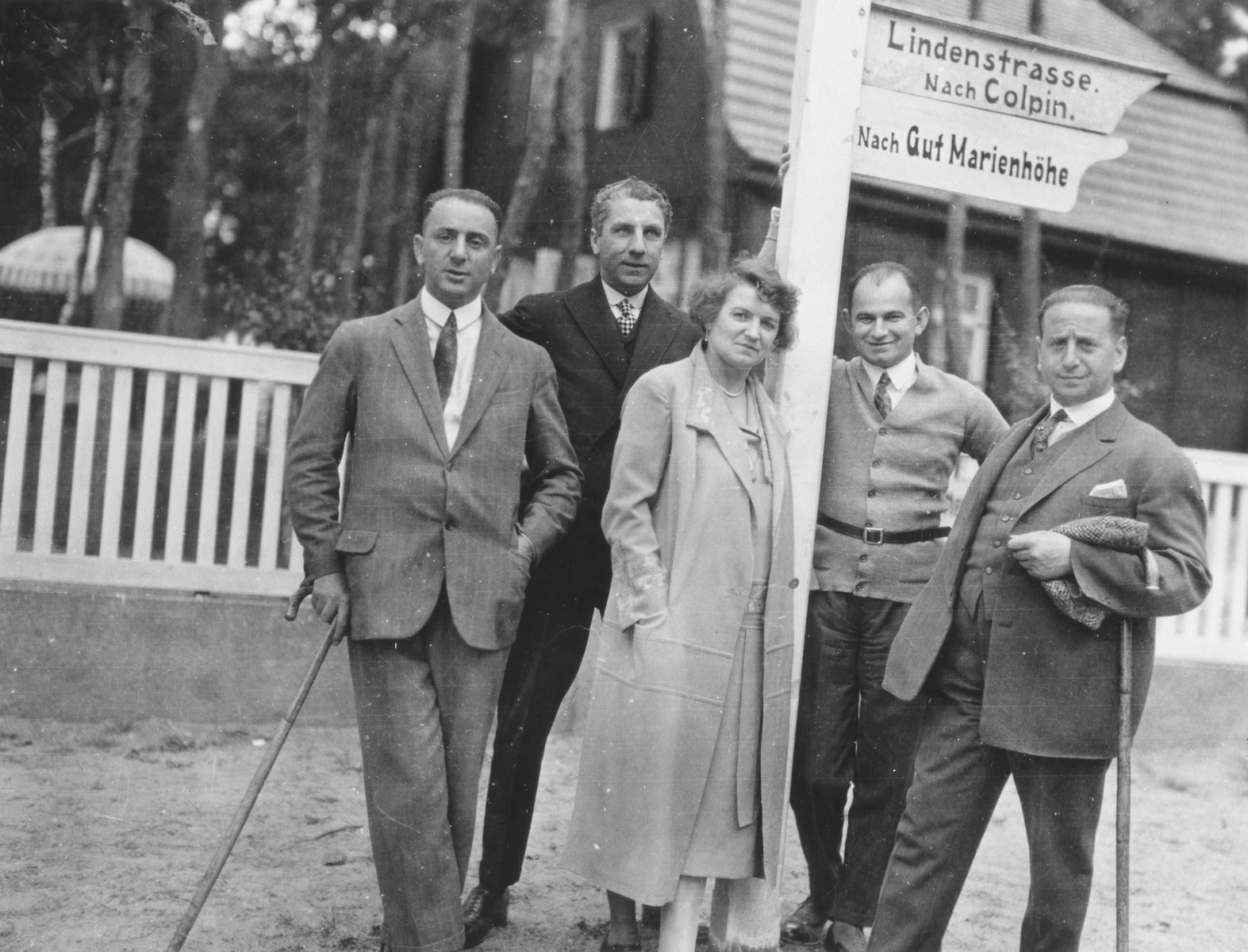 A group of German Jews poses next to a street sign in a resort town in Germany.

Among those pictured is Ludwig Plachte (at the left) and Mr. Salomon, Ludwig's business partner (on the right).
