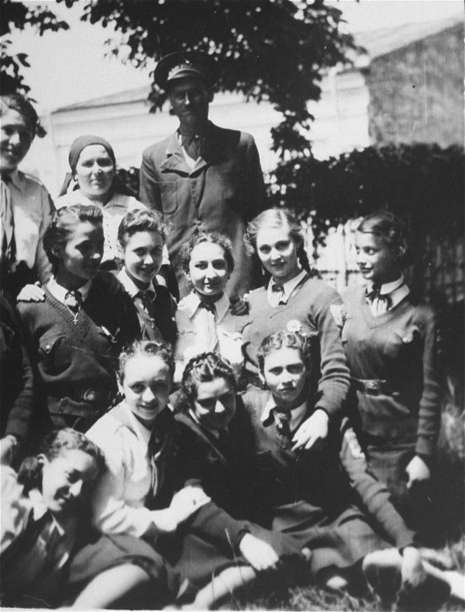 Group portrait of Jewish students in Bucharest, Romania.

Among those pictured is Jeanine Gutman (kneeling in the second row in the middle).