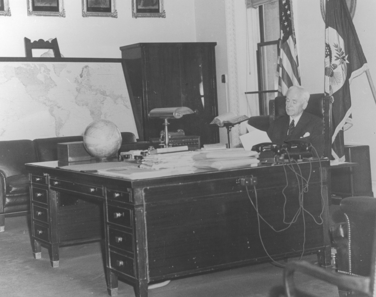 Secretary of State Cordell Hull in his office.