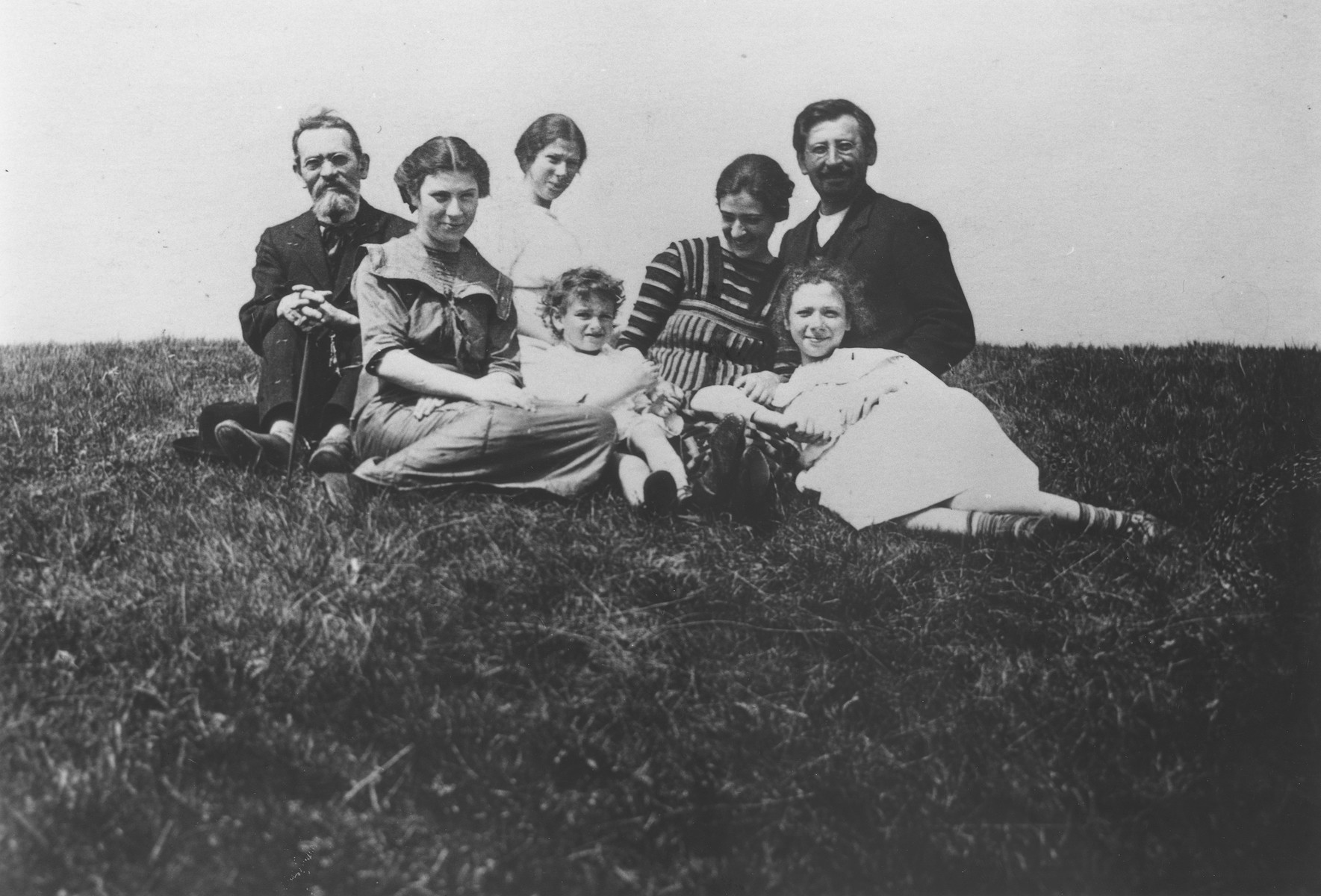 Group portrait of the Mikolaevsky family at their dacha in the village of Strelna, a suburb of St. Petersburg.