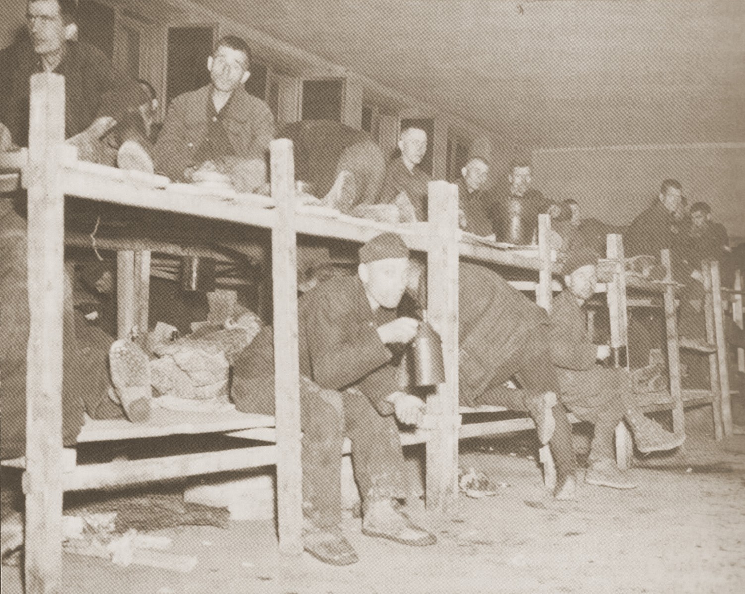 Soviet POWs sit on their bunks shortly after their liberation by the U.S. Ninth Army.